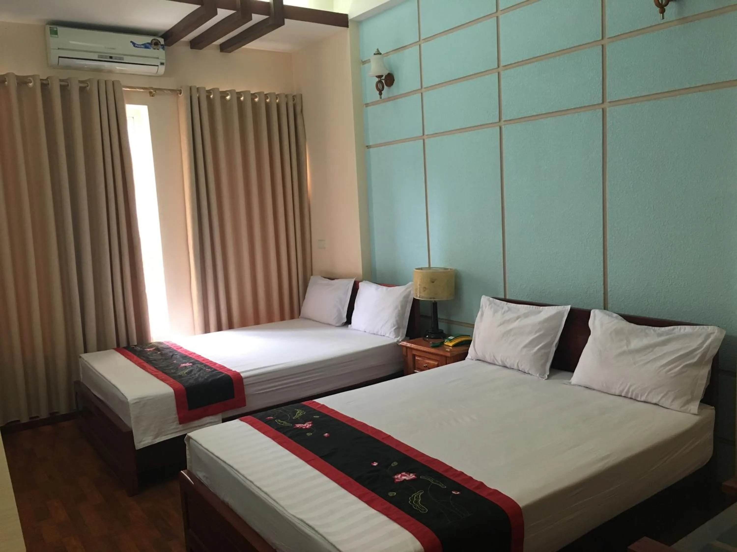 Bed in Sunrise Hotel