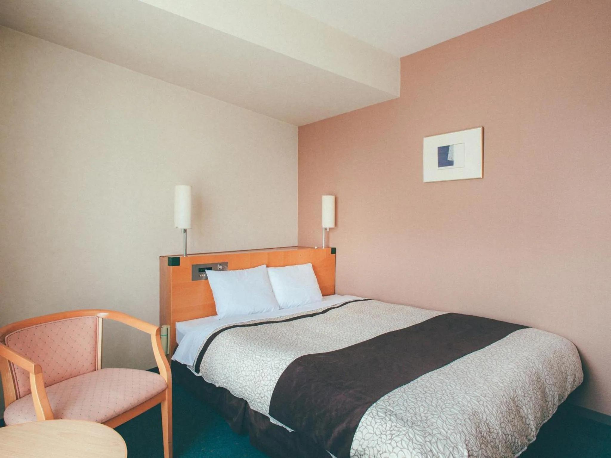 Bed in Kuretake Inn Okayama