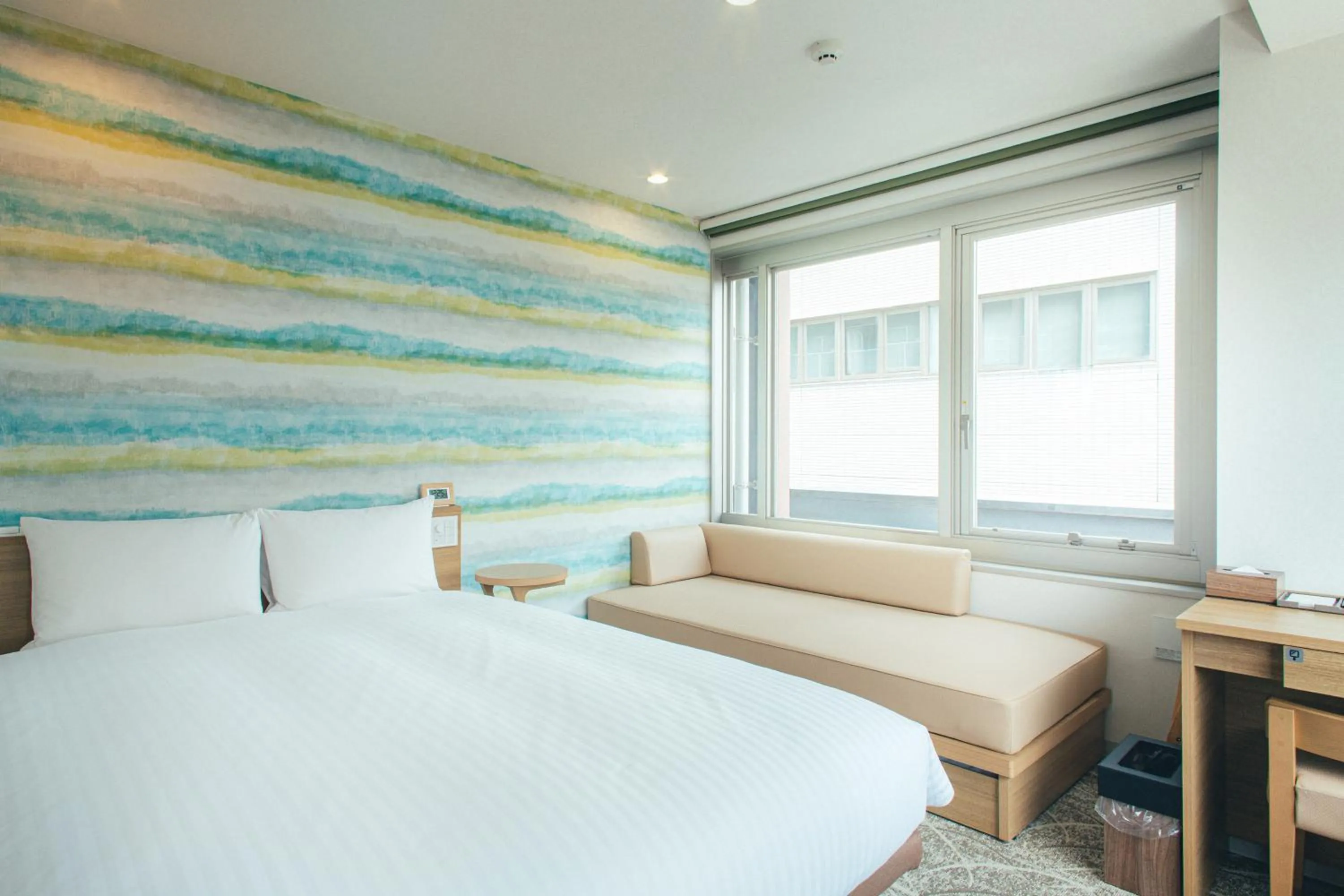 Bed in Kuretake Inn Okayama