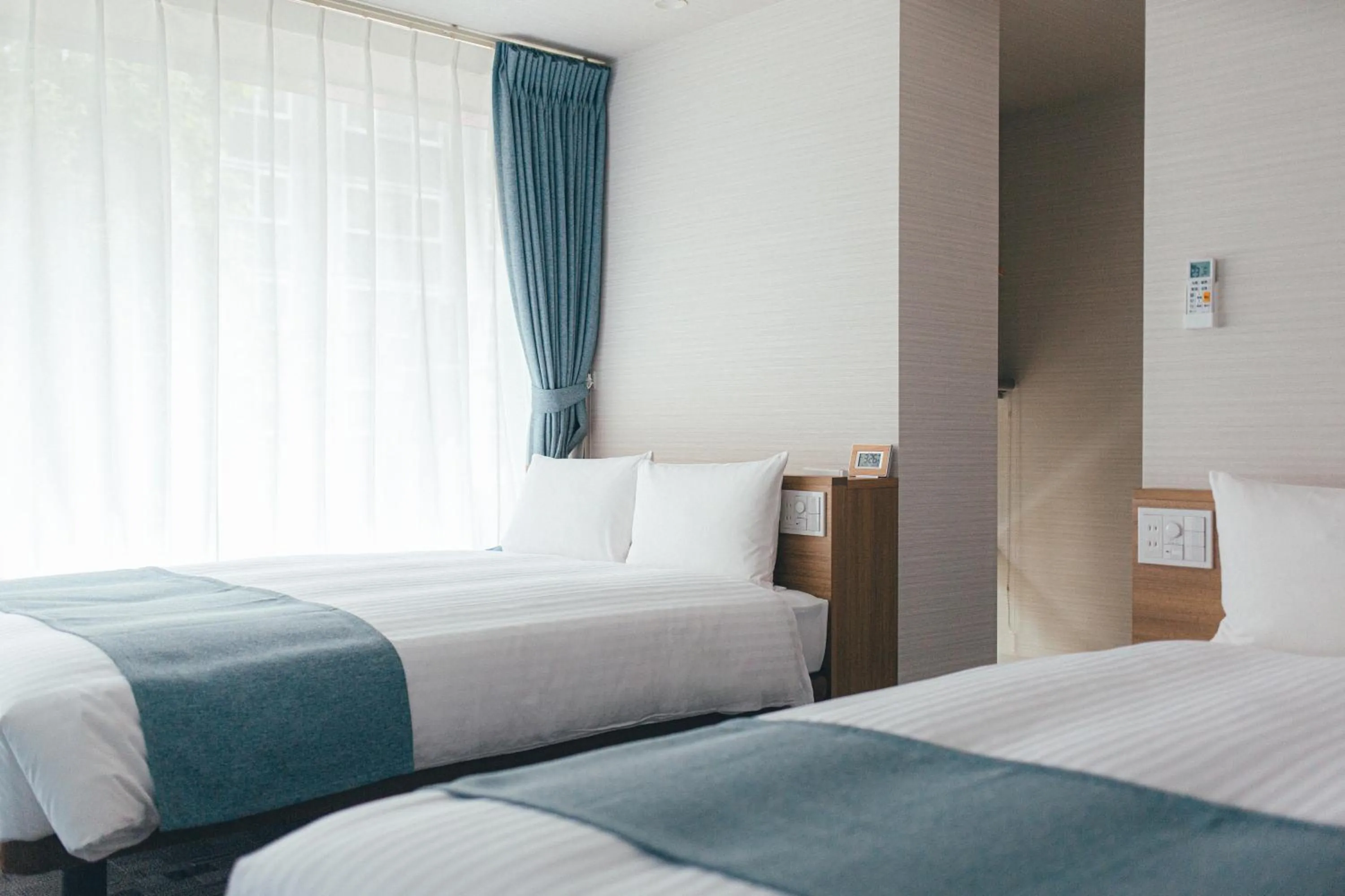 Bed in Kuretake Inn Okayama