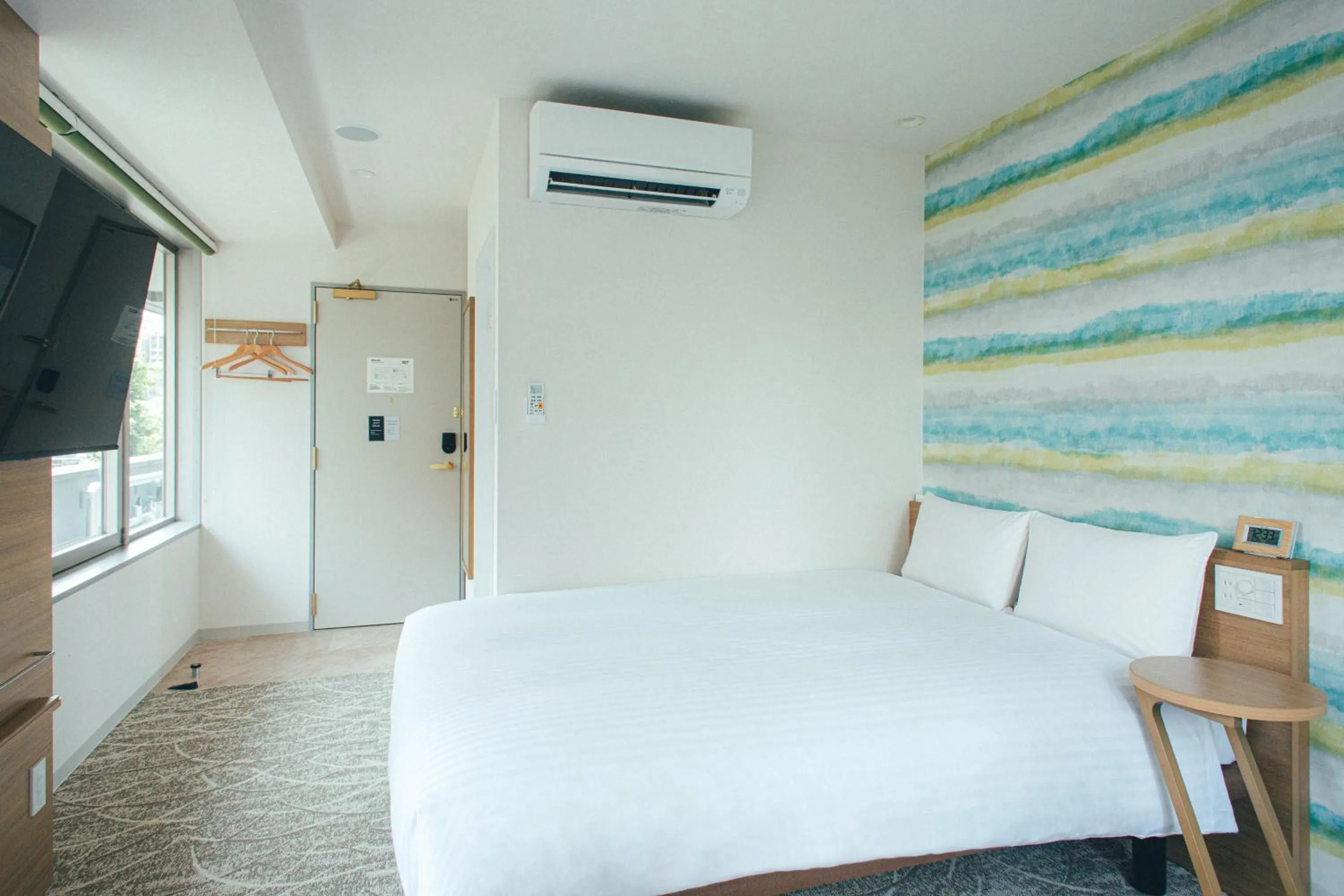 Bed in Kuretake Inn Okayama