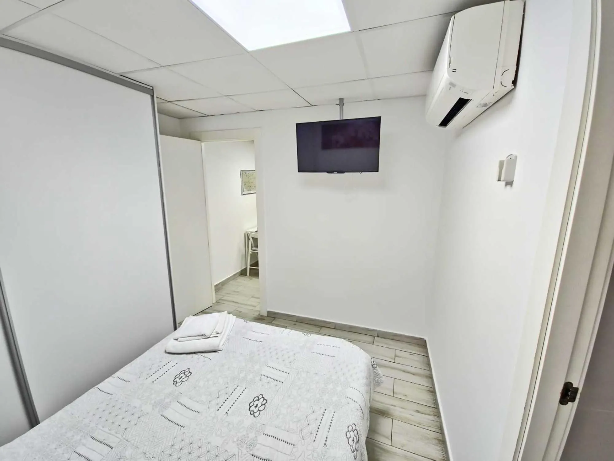 Bed in Apartamentos Arena y Cairo