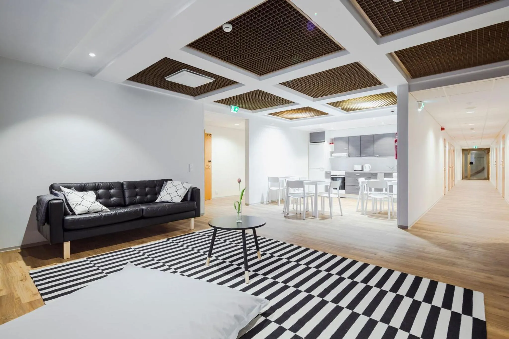 Communal lounge/ TV room, Bed in Hostel Café Koti