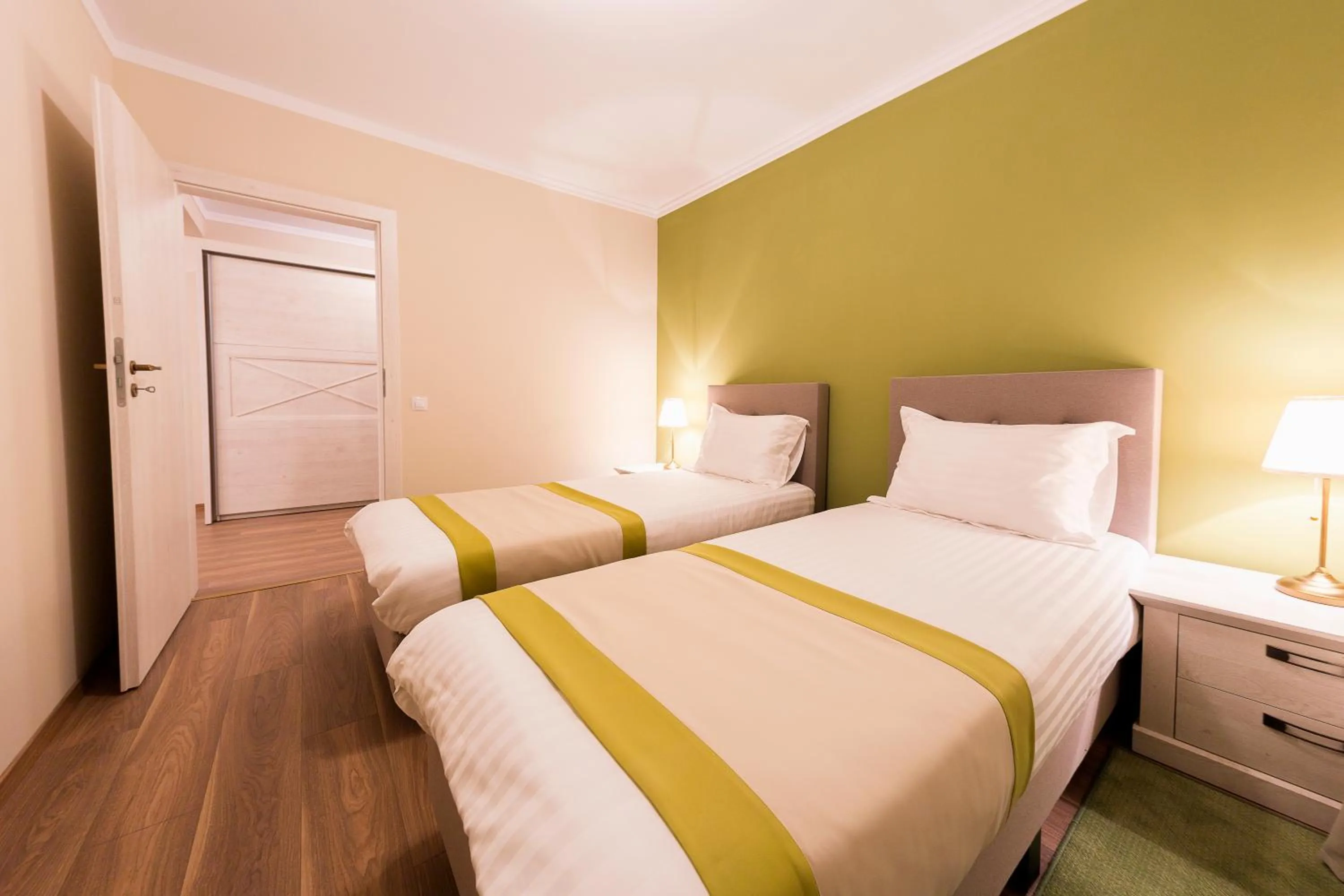 group of guests, Bed in Crema Residence