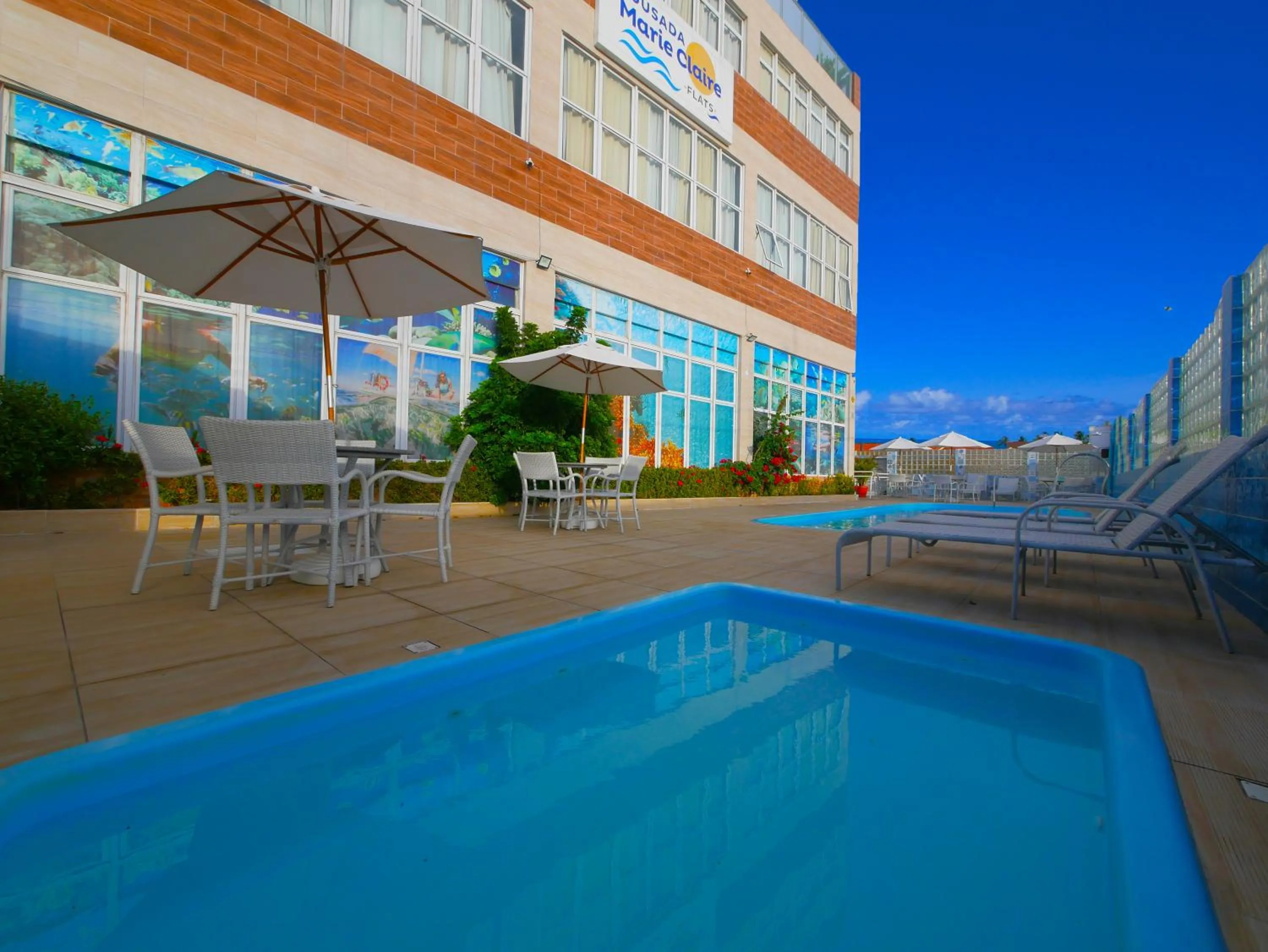Pool view in Pousada Marie Claire Flats
