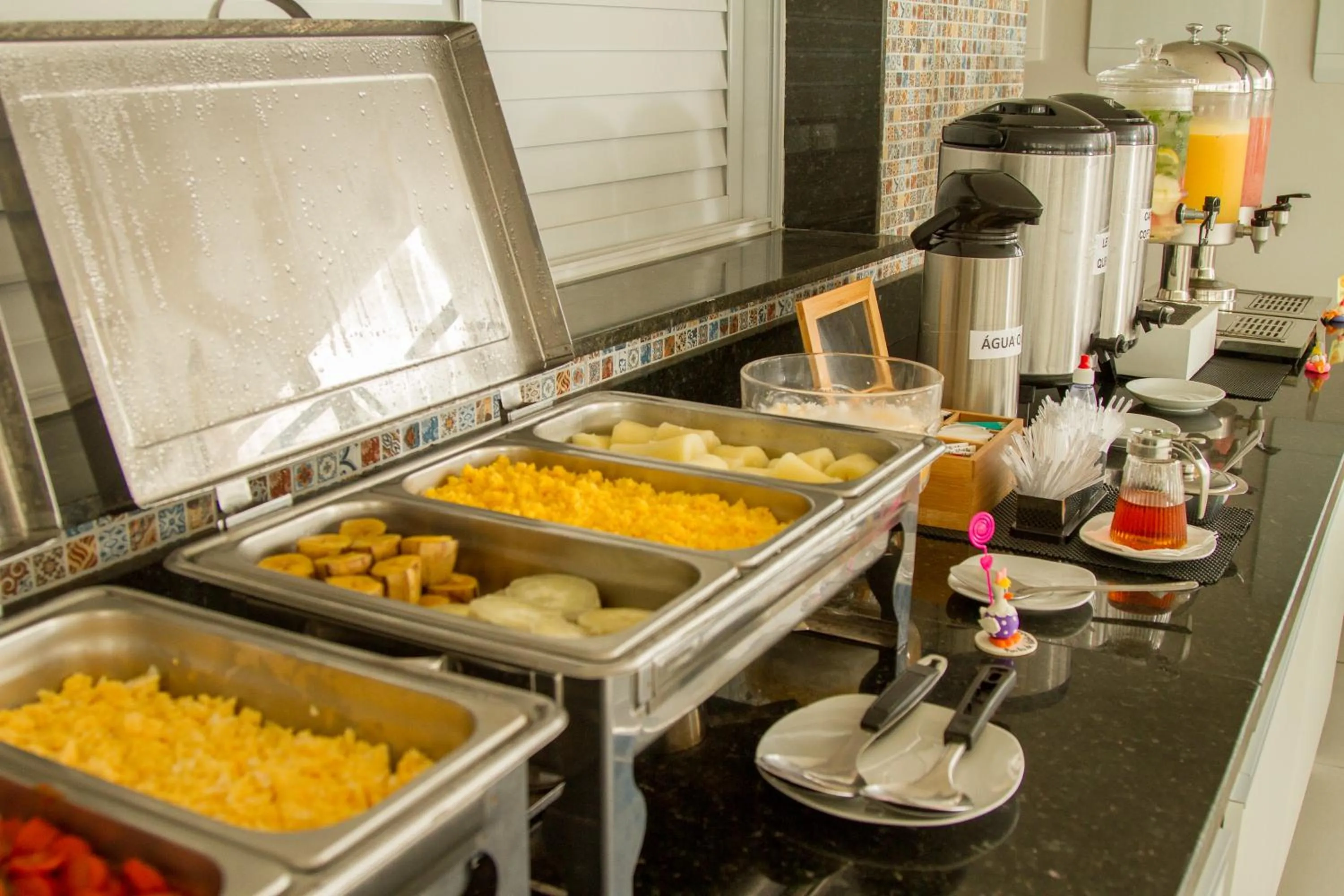 Buffet breakfast in Pousada Marie Claire Flats