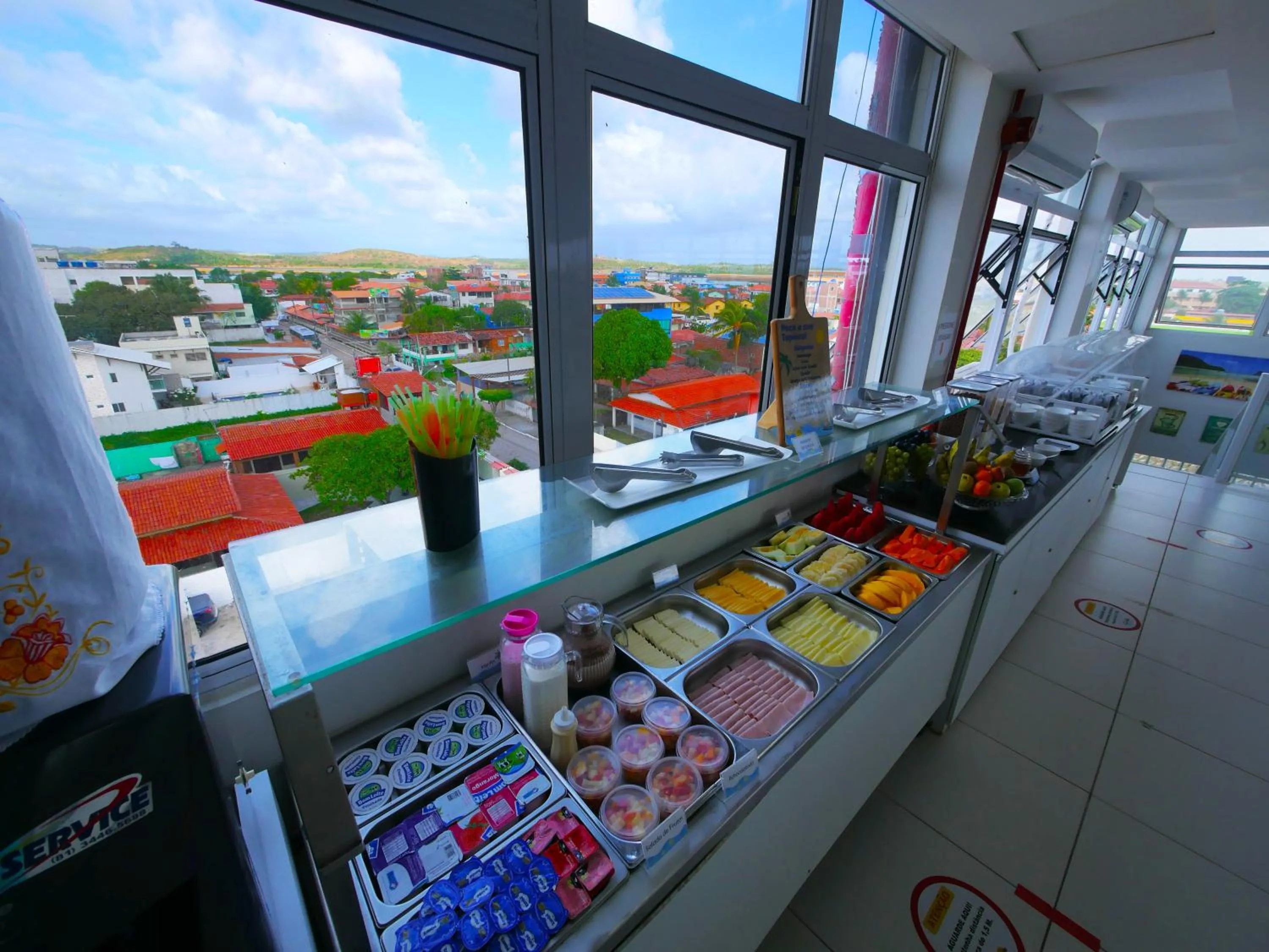 Buffet breakfast in Pousada Marie Claire Flats