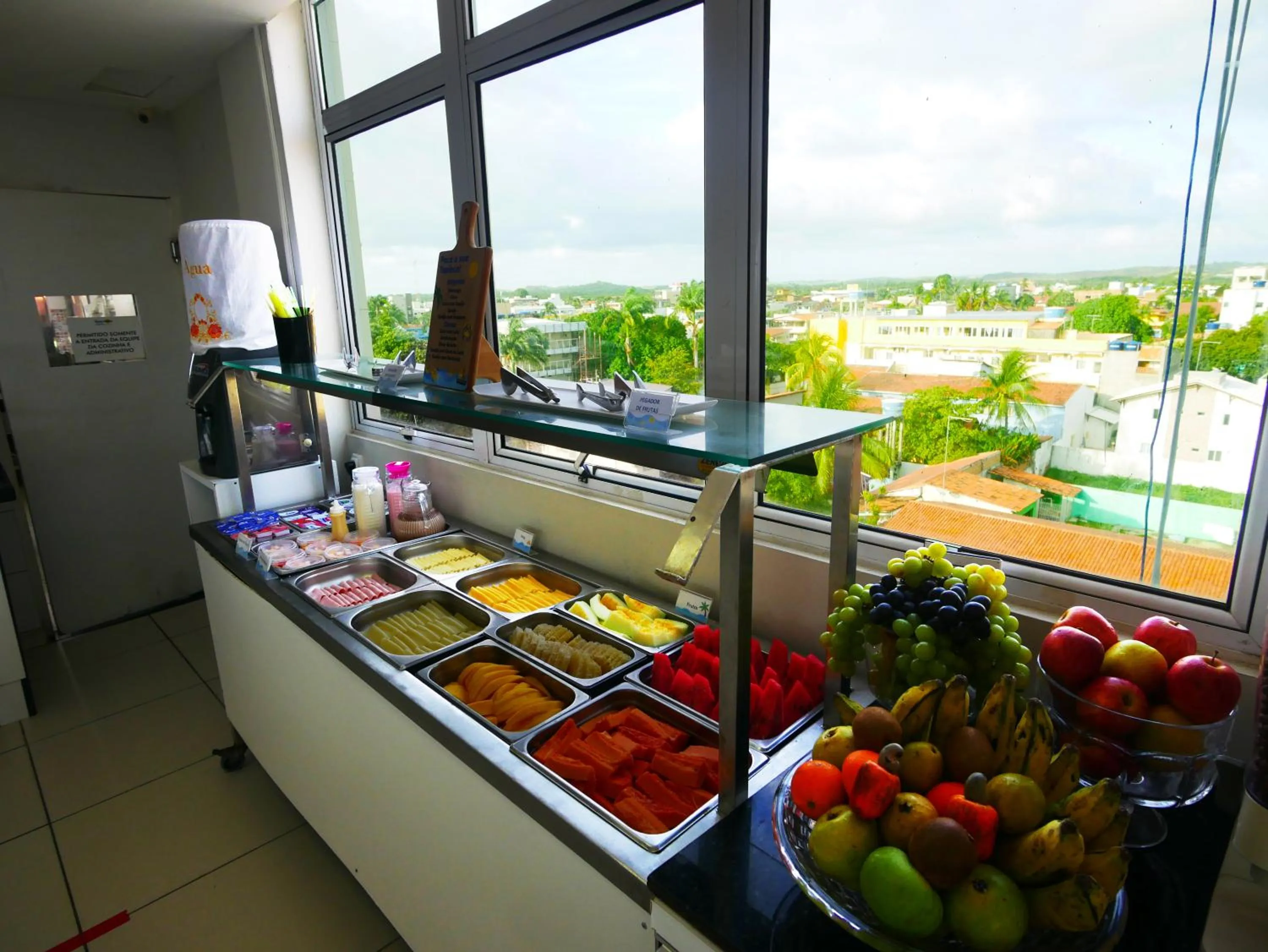 Buffet breakfast in Pousada Marie Claire Flats