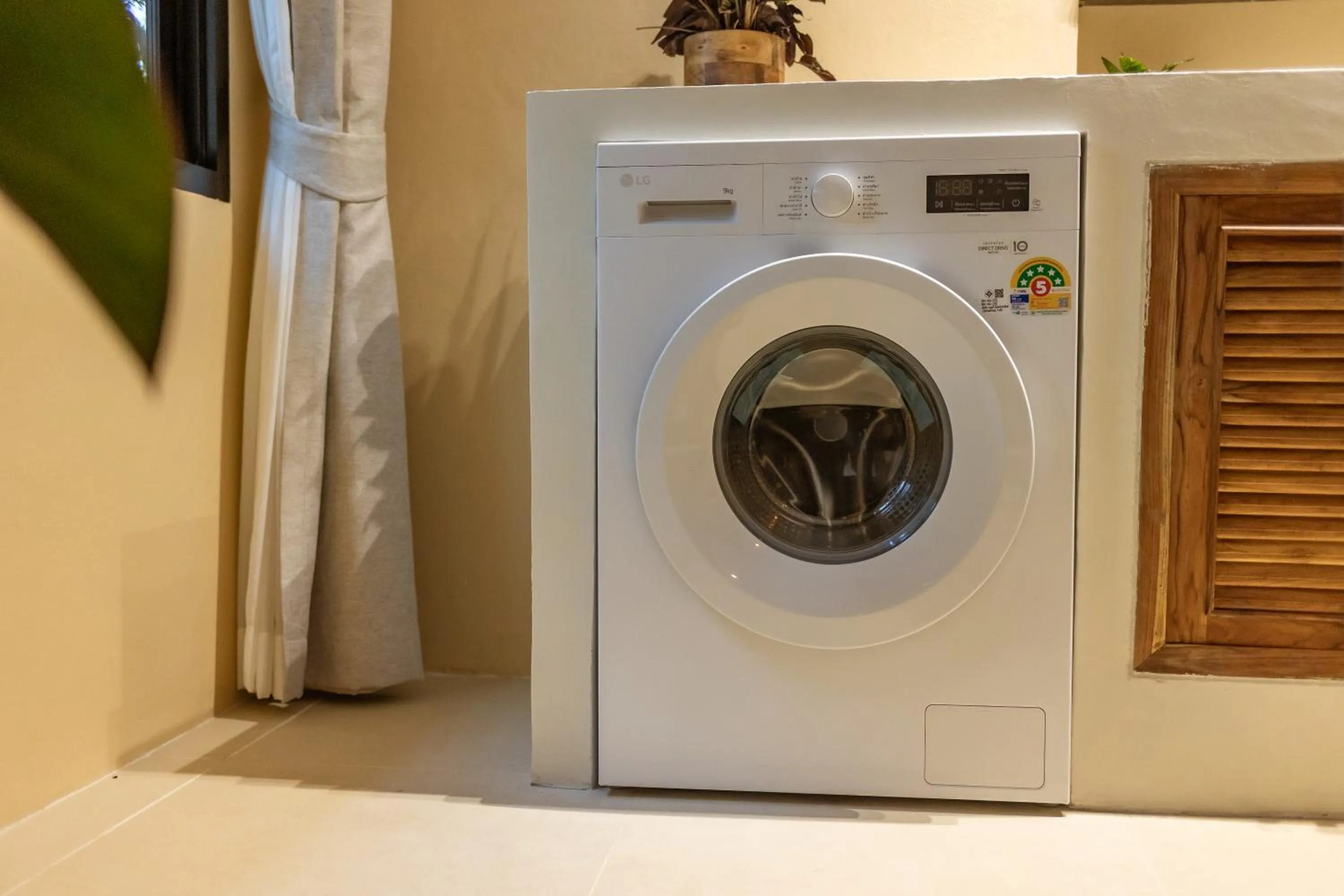 washing machine in Indie Beach Bungalows