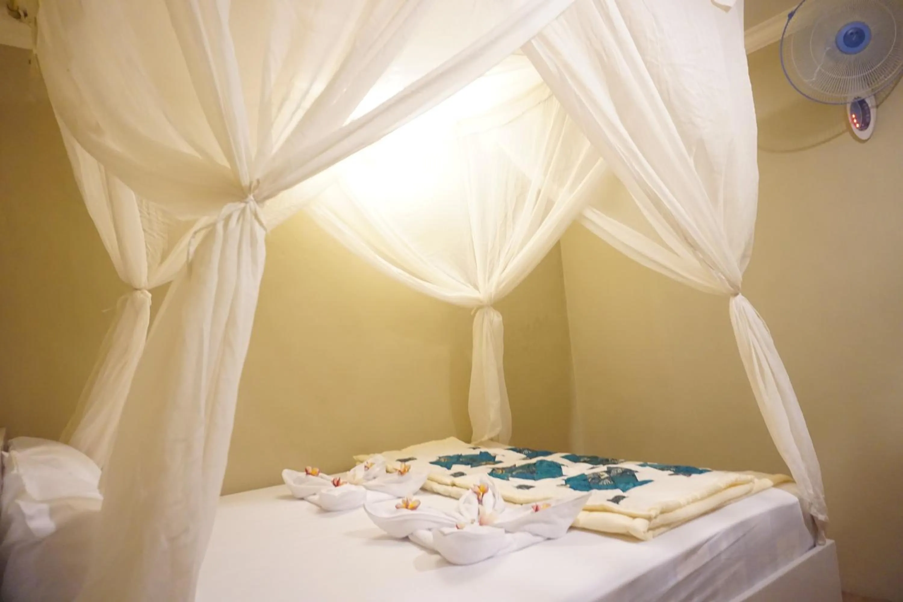 Bed in Damuh Guest House