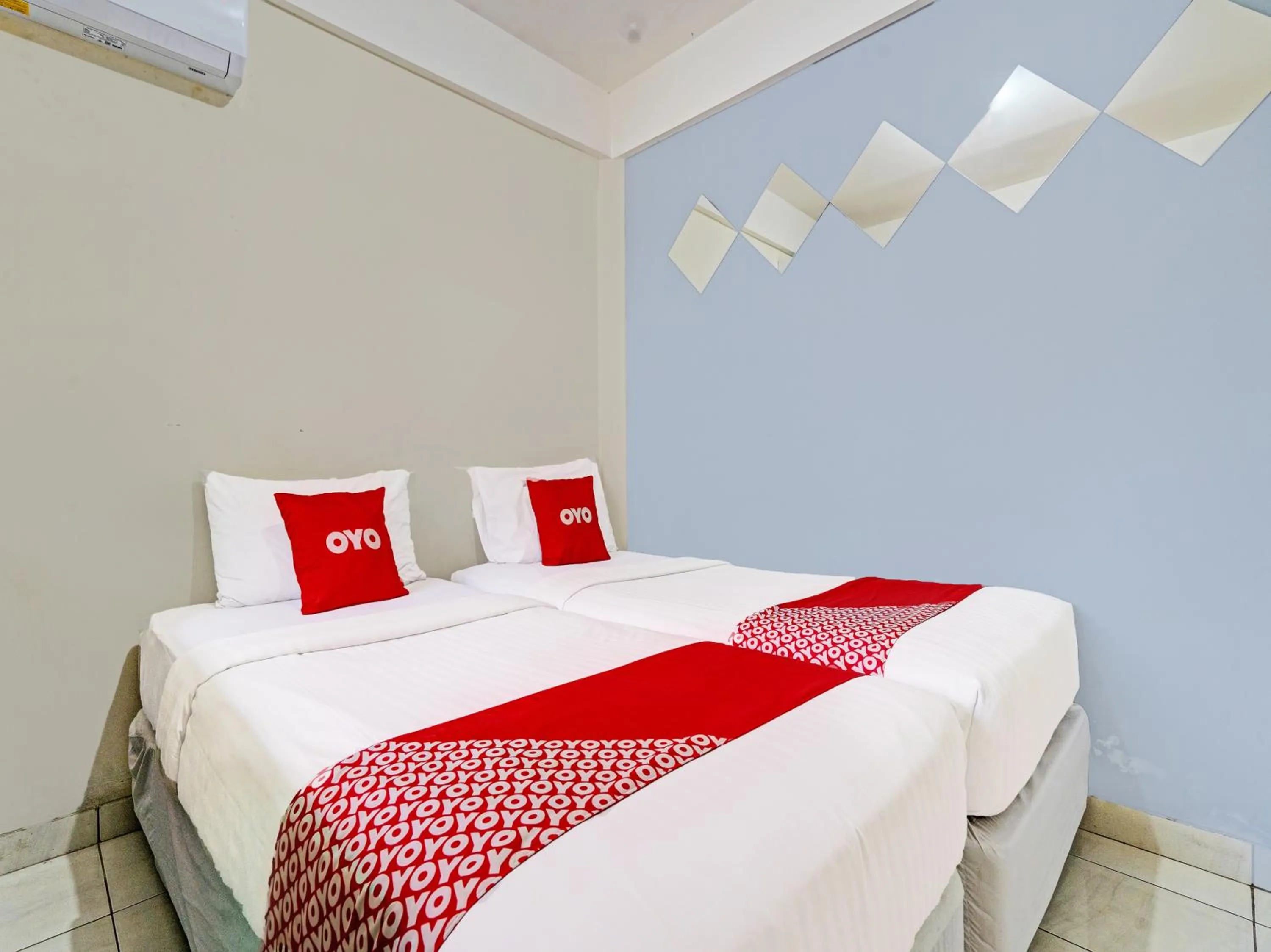 Bedroom in OYO 1699 Verona Residence