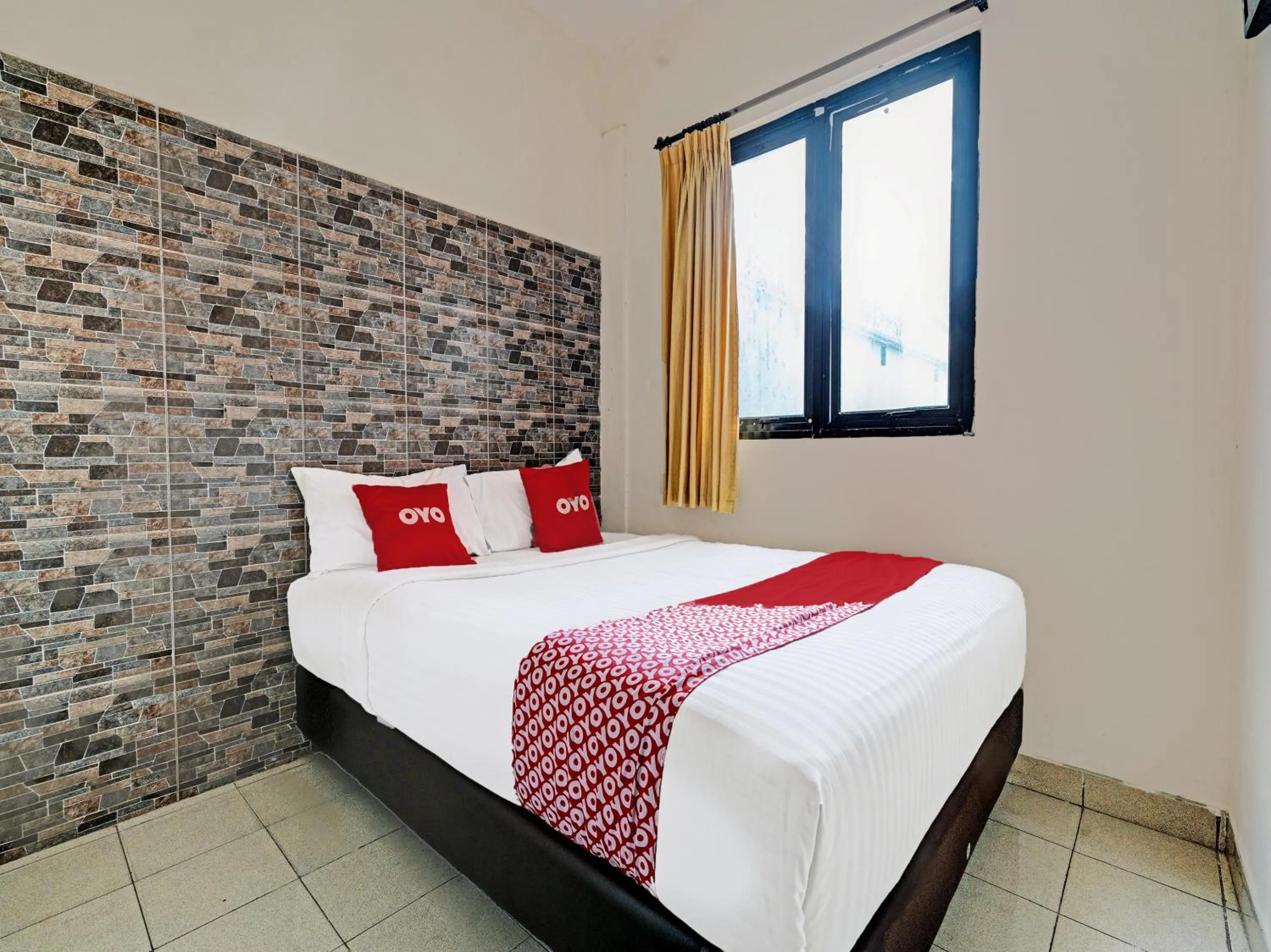 Bedroom in OYO 1699 Verona Residence