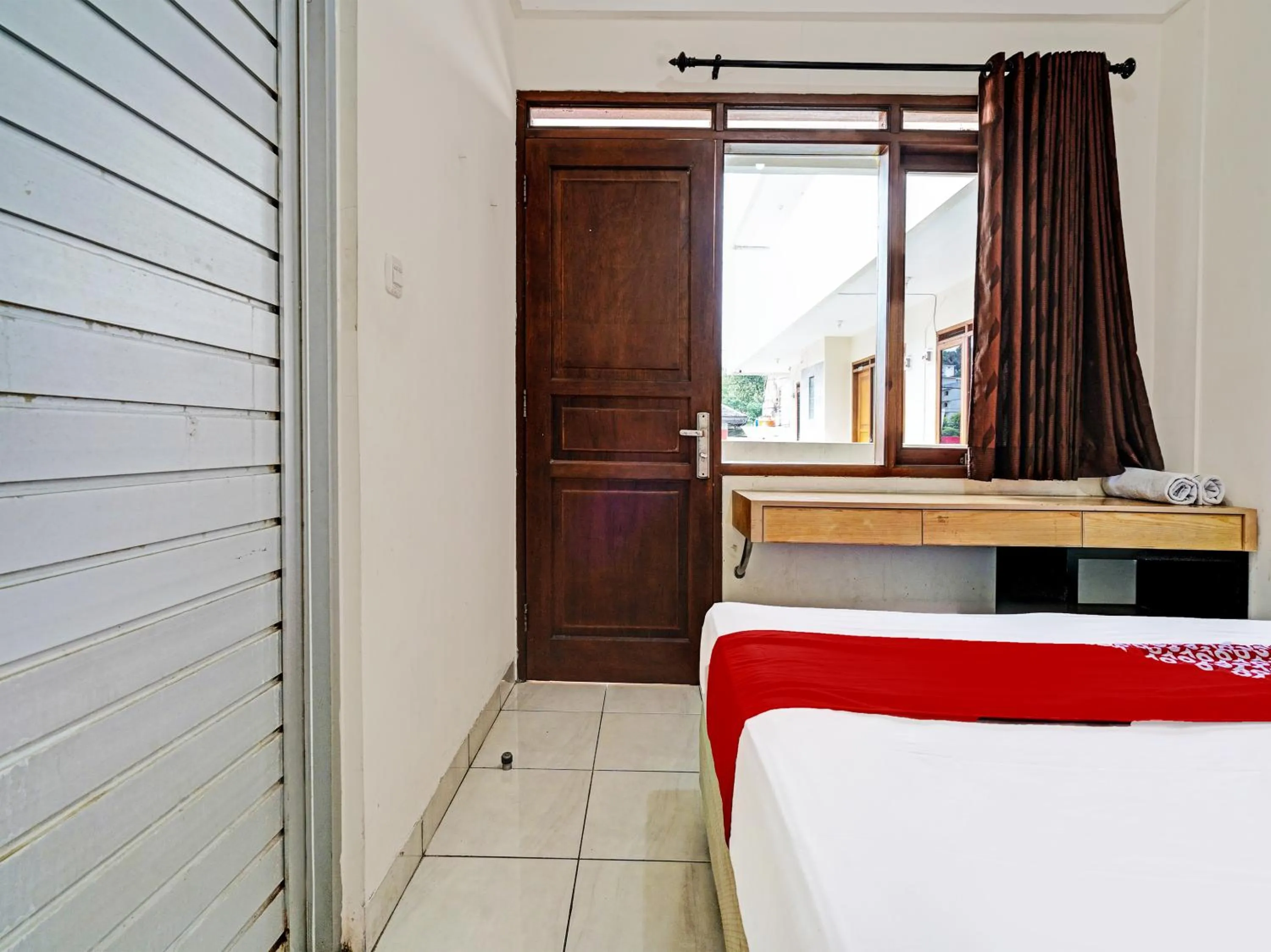 Bedroom in OYO 1699 Verona Residence