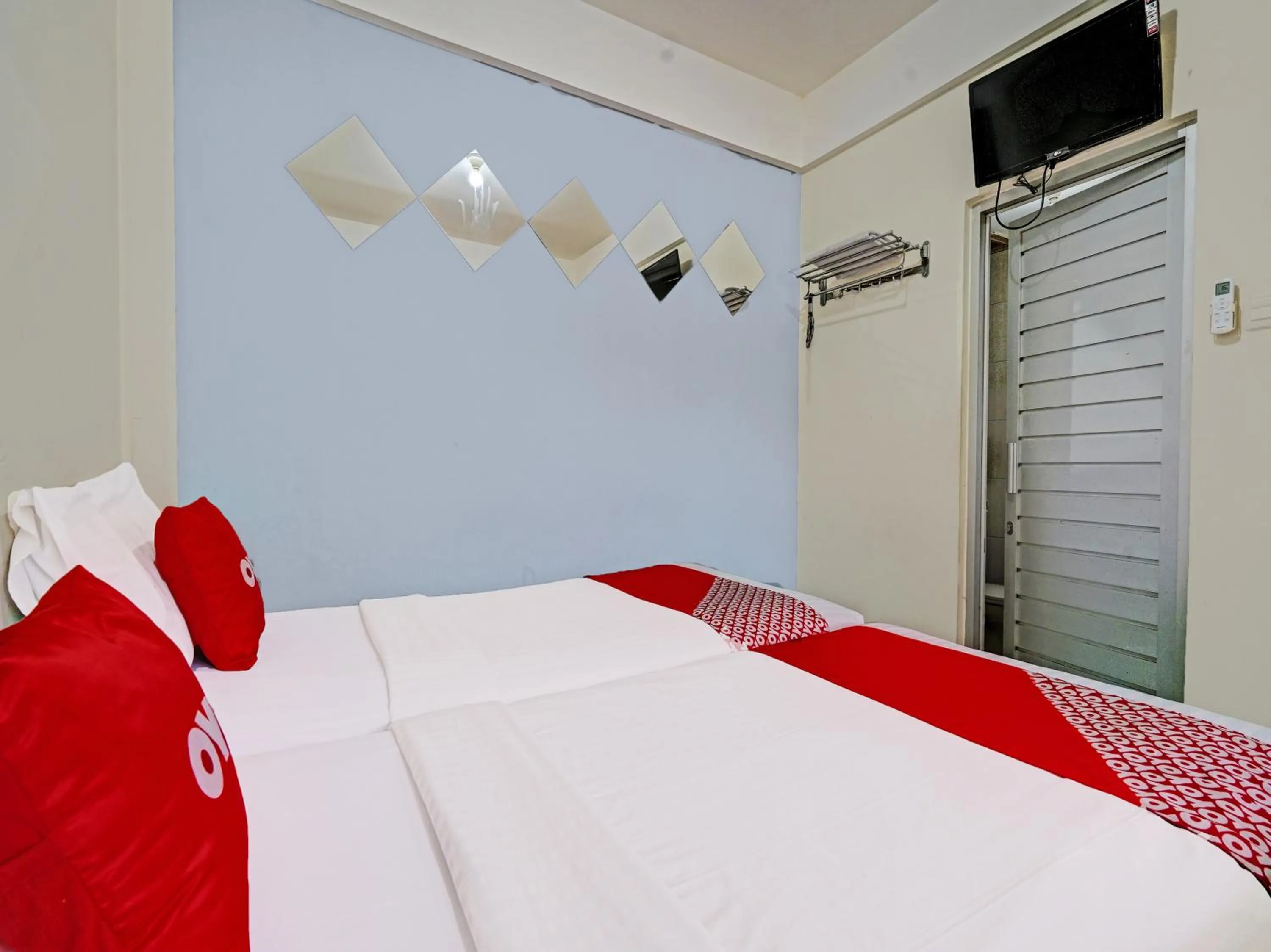 Bedroom in OYO 1699 Verona Residence