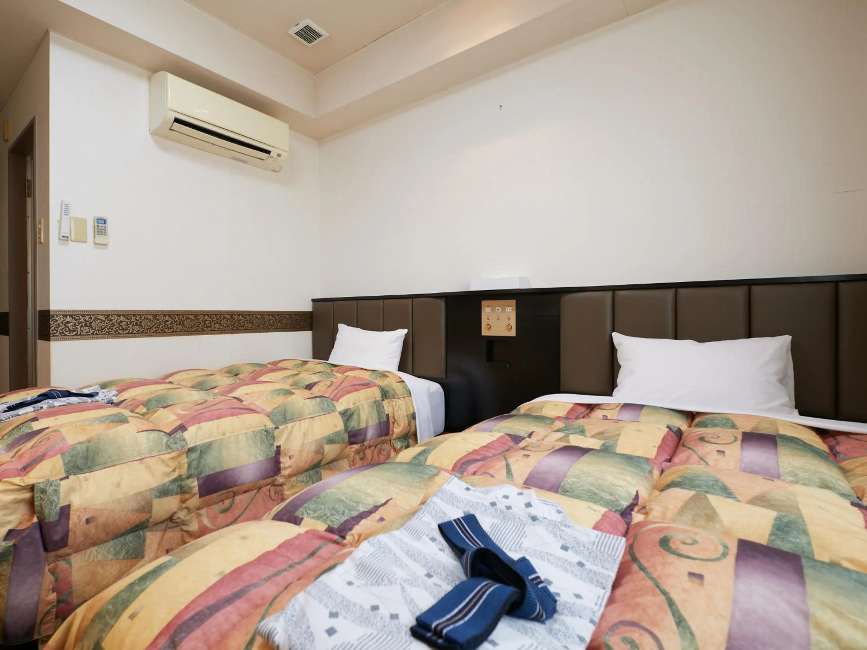 Photo of the whole room, Bed in Gamagori Hotel