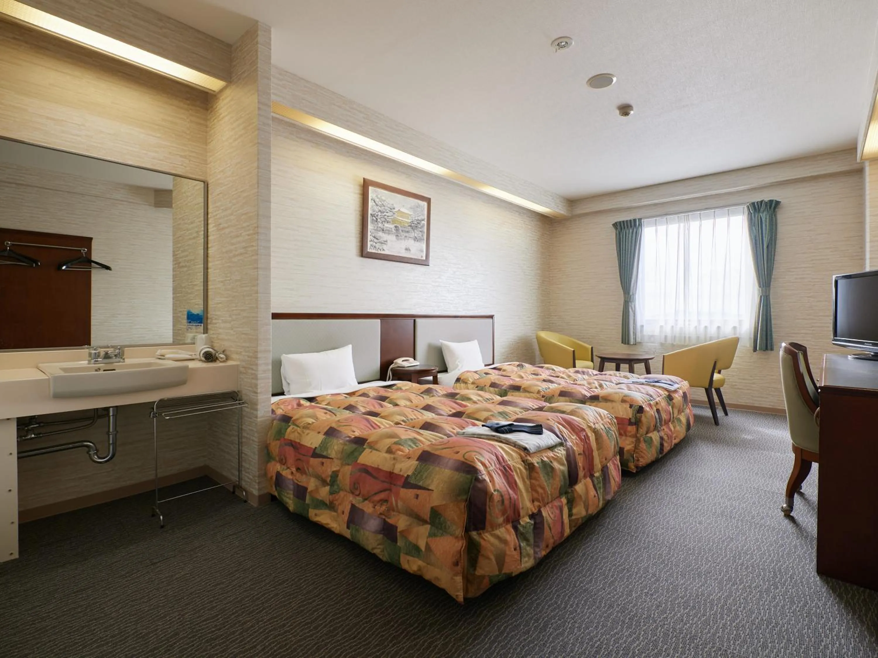 Photo of the whole room, Bed in Gamagori Hotel