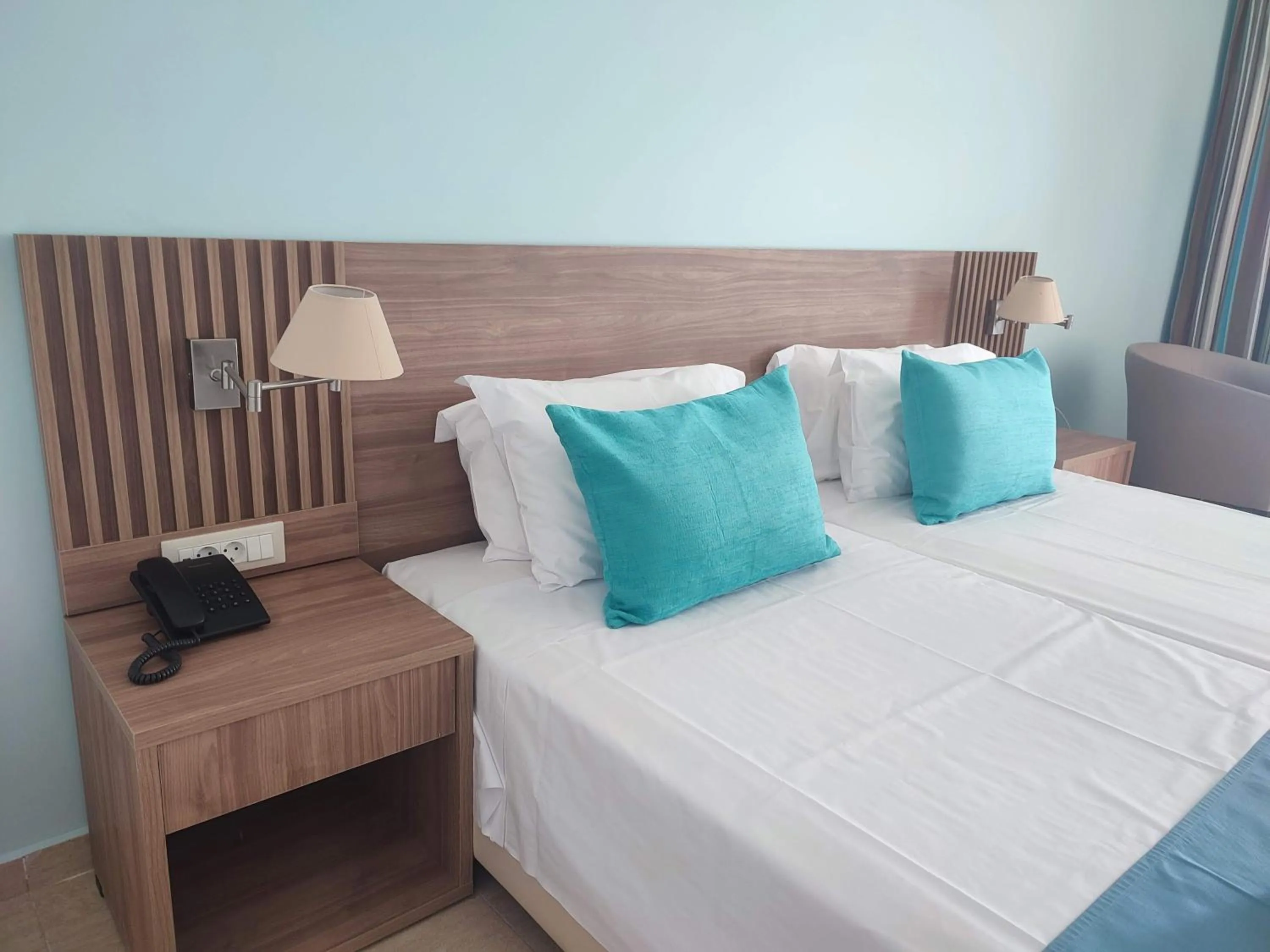 Photo of the whole room, Bed in Asterias Beach Resort