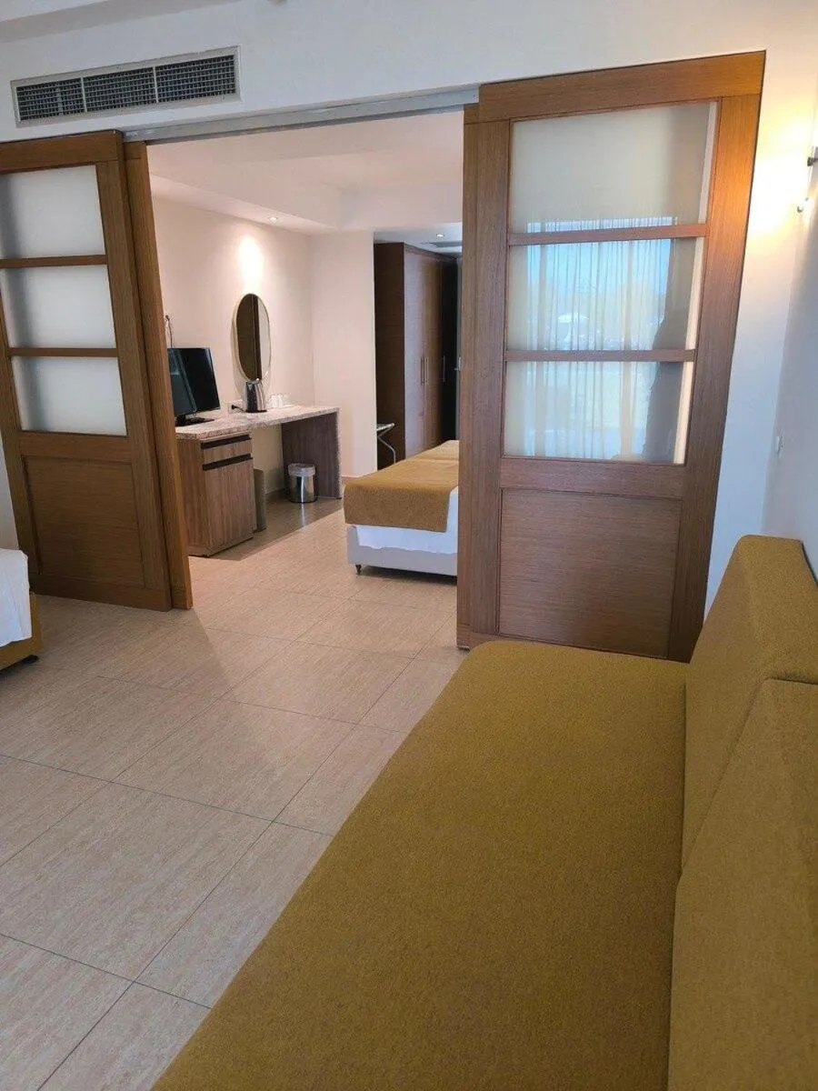 Photo of the whole room, Bed in Asterias Beach Resort