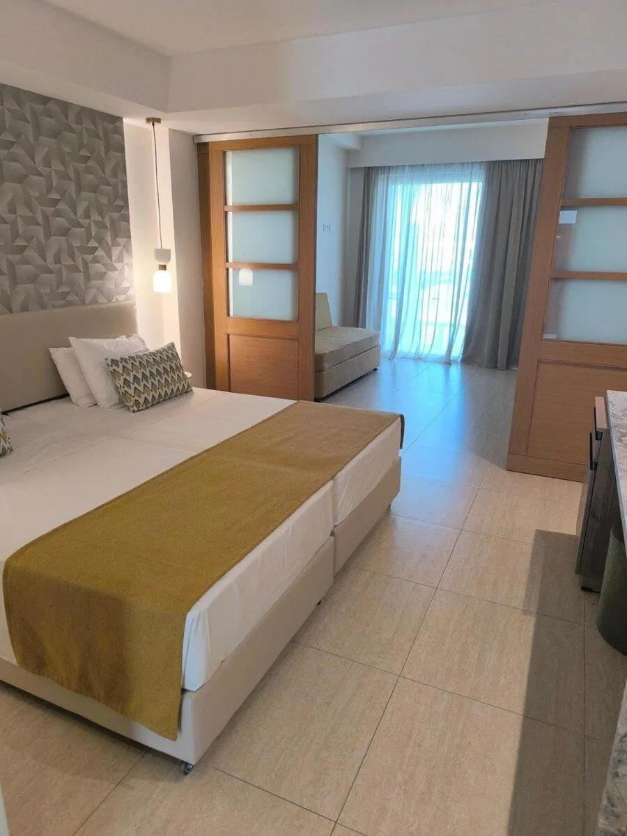 Photo of the whole room, Bed in Asterias Beach Resort