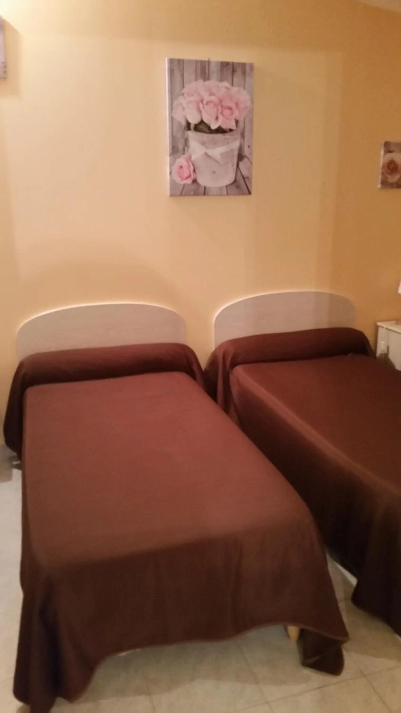 Bed in Hostellerie des Colonnes