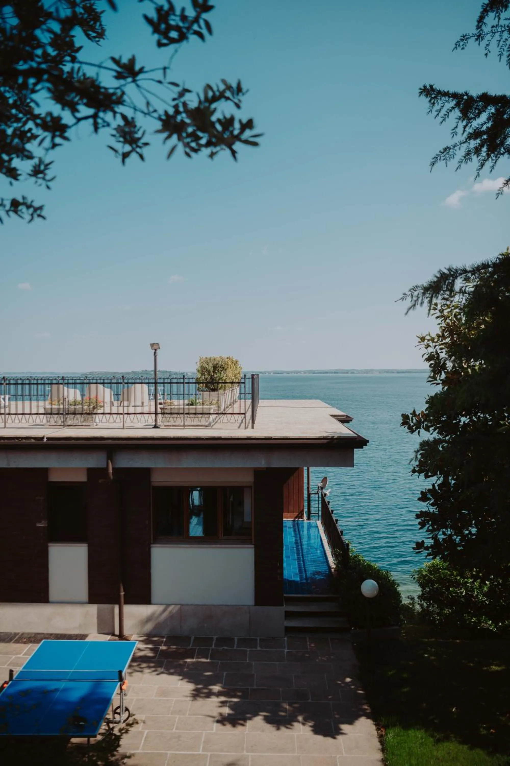 Patio in Holiday Garda Villa Dolcelago Lake Front
