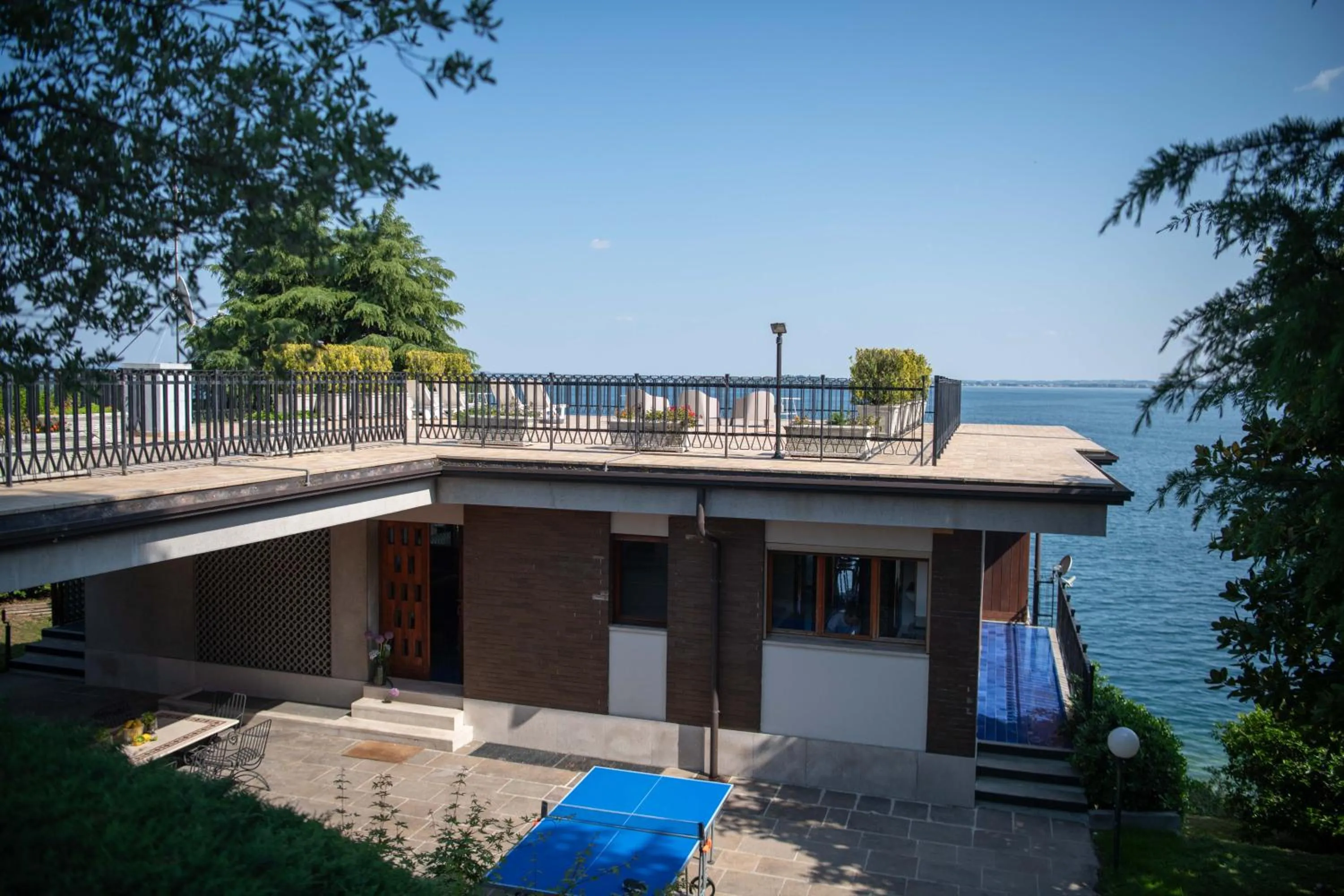 Patio in Holiday Garda Villa Dolcelago Lake Front