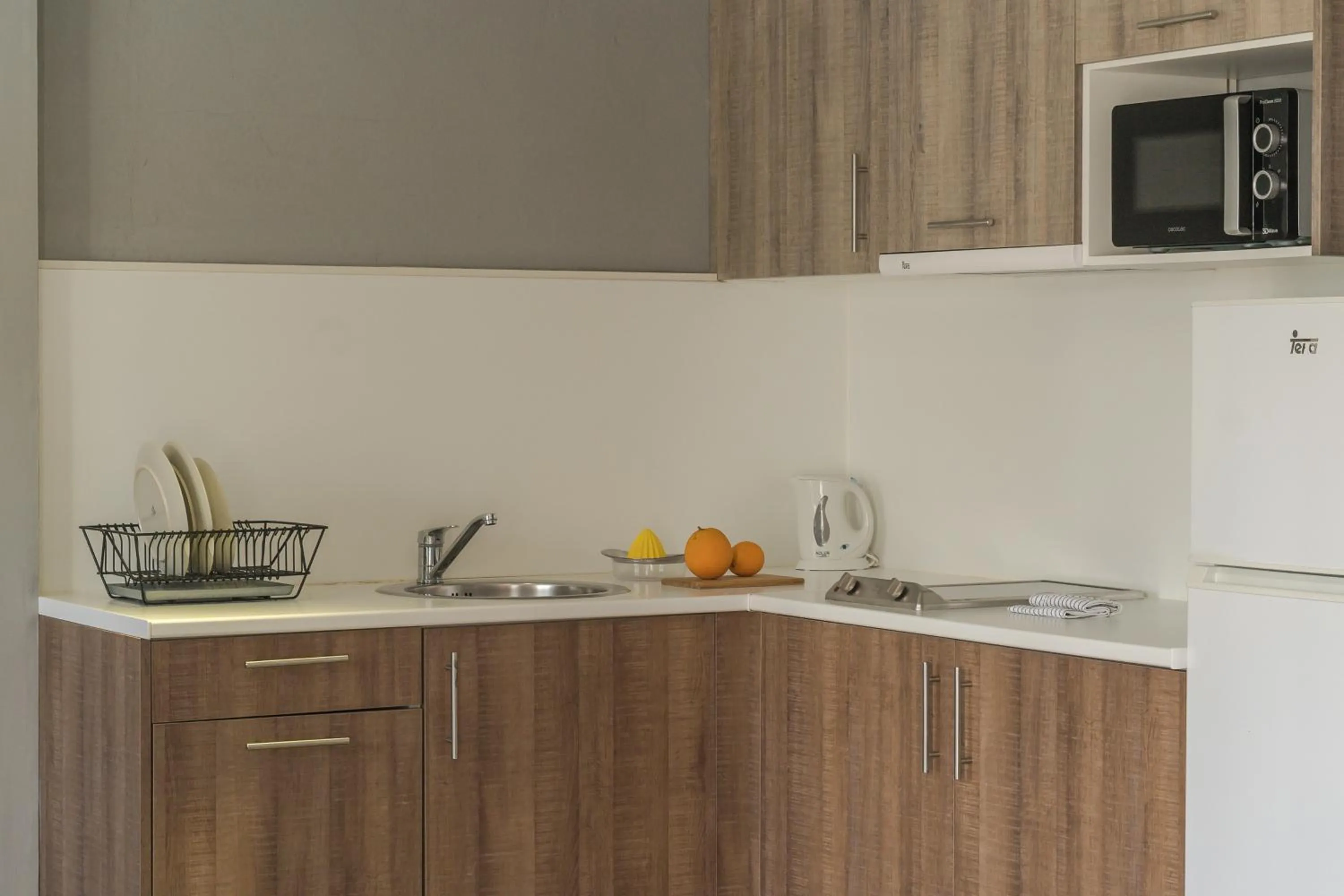 Kitchen or kitchenette in Aparthotel Nelva Resort