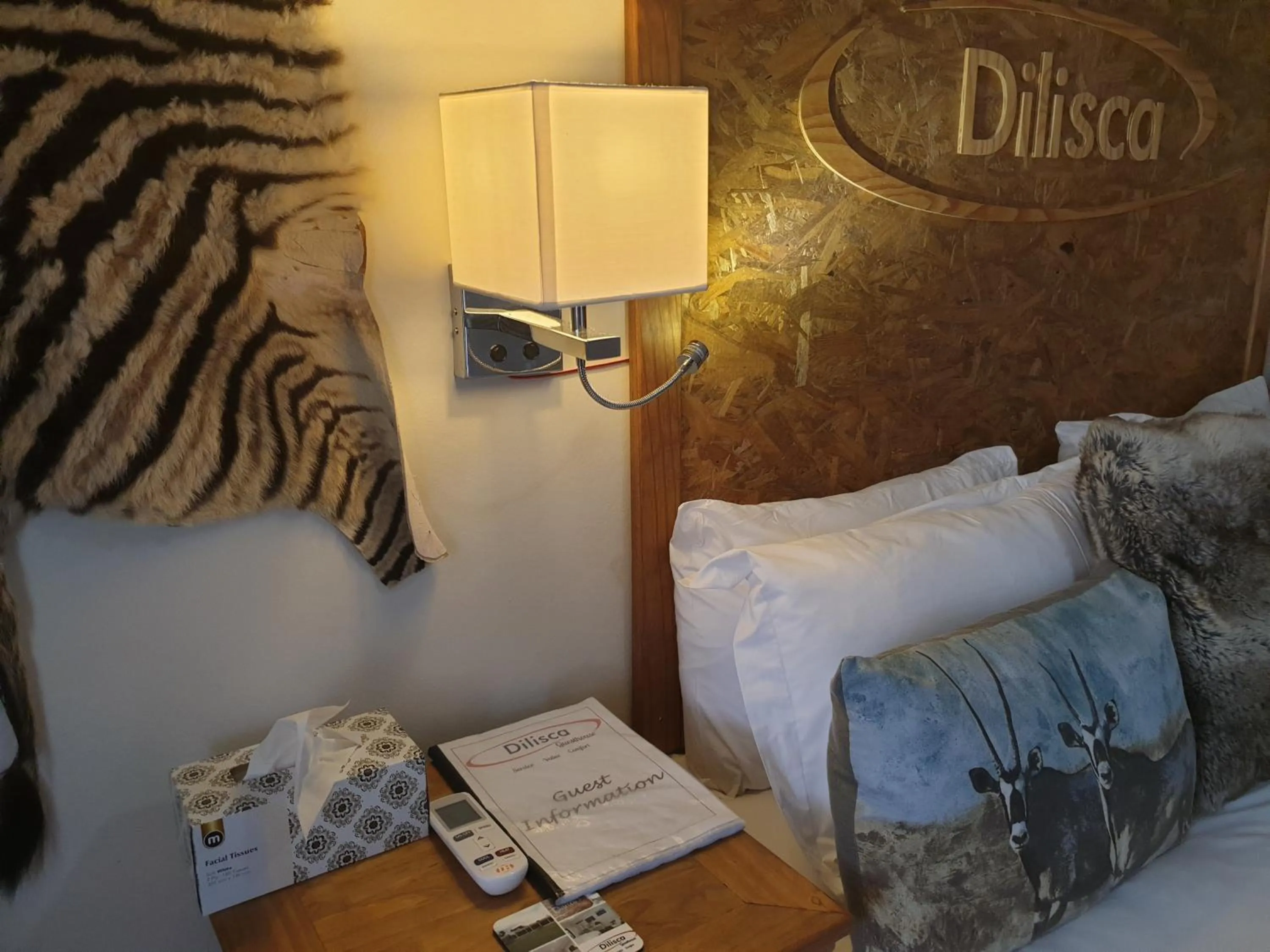 Logo/Certificate/Sign, Bed in Dilisca Guesthouse