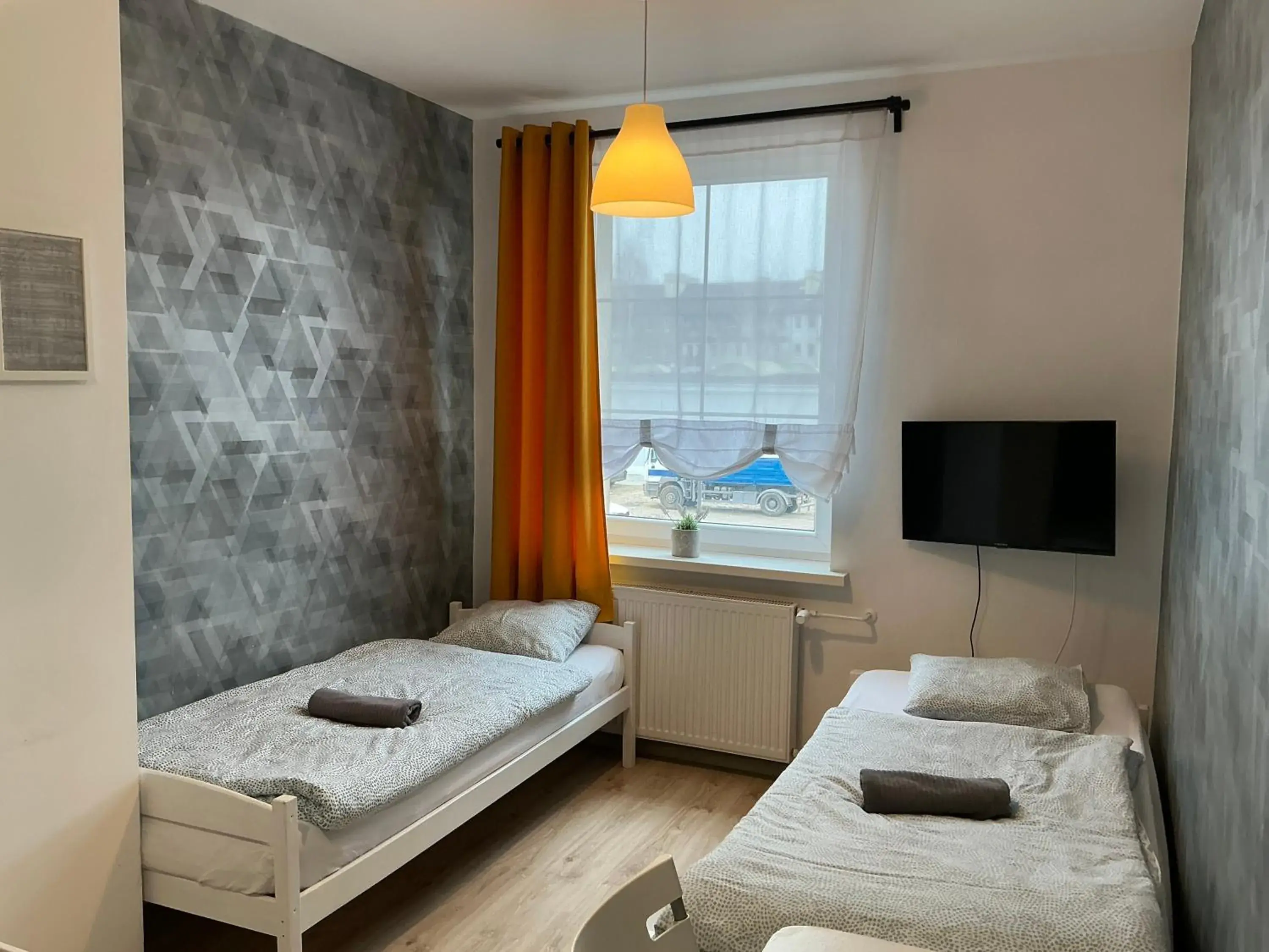 Triple Room with Shared Bathroom in Hostel Przed Świtem Triple Room with Shared Bathroom in Hostel Przed Świtem