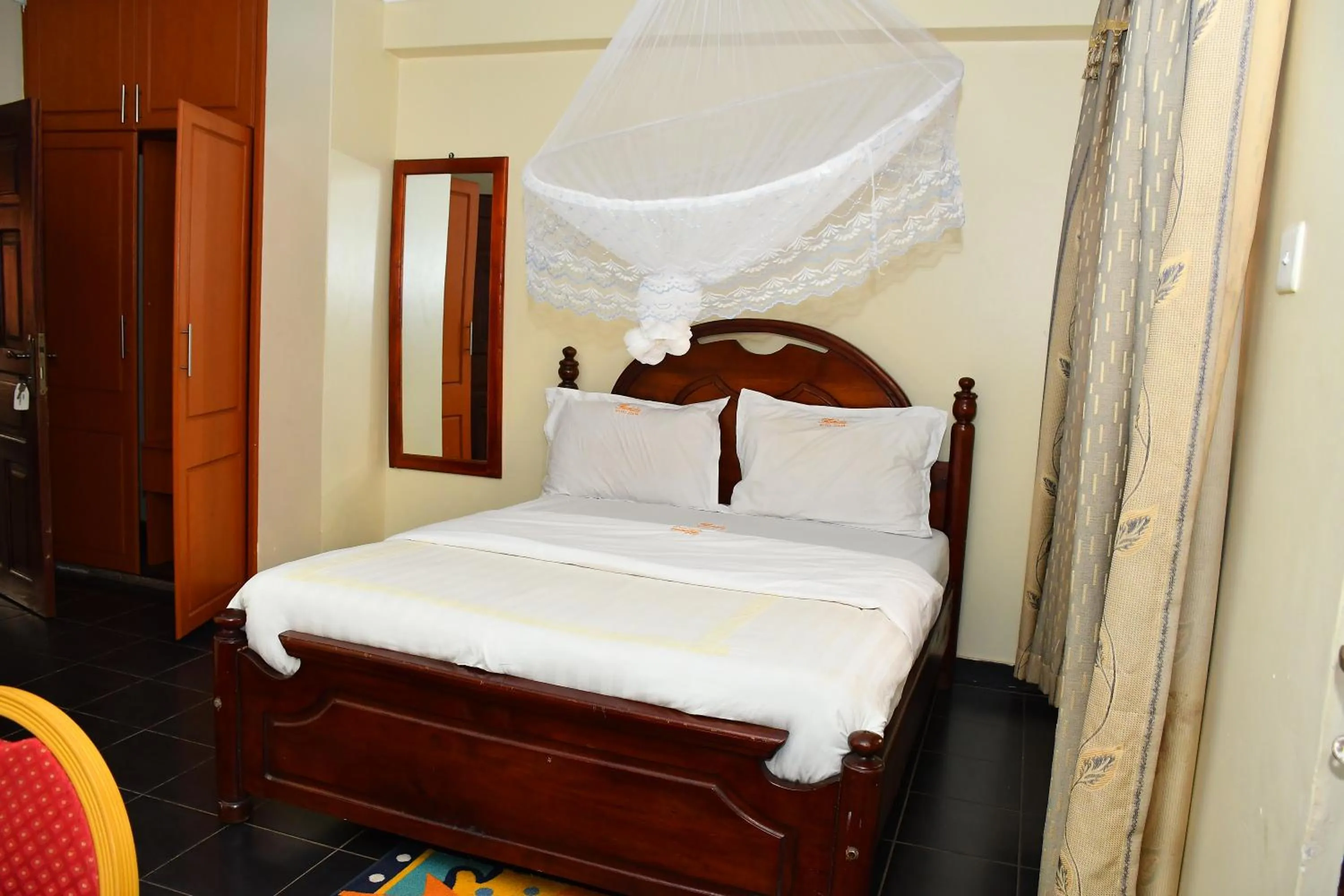 Bed in Florida Hotel Zaana Kampala