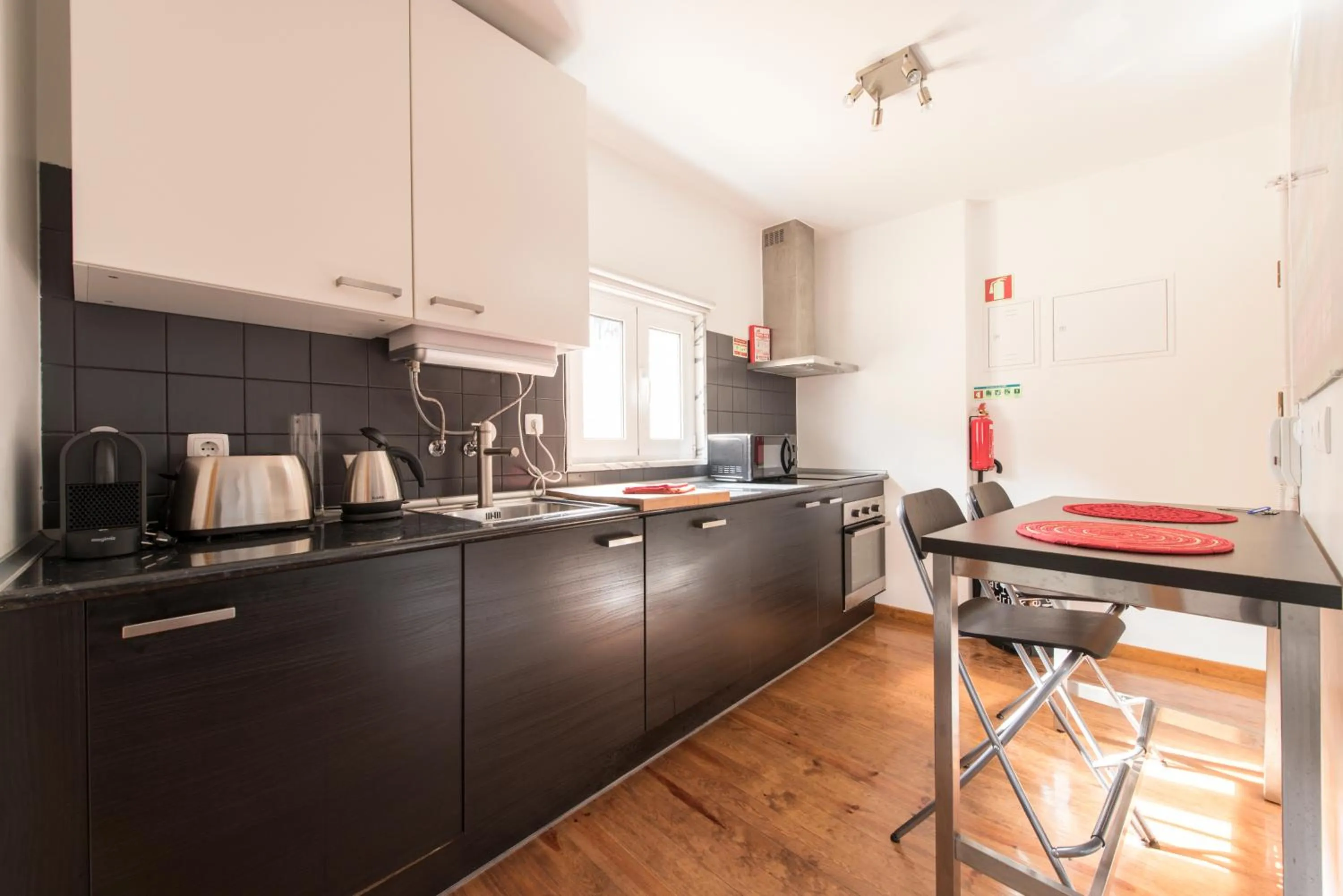 Kitchen or kitchenette in Cozy apartment in Bairro Alto