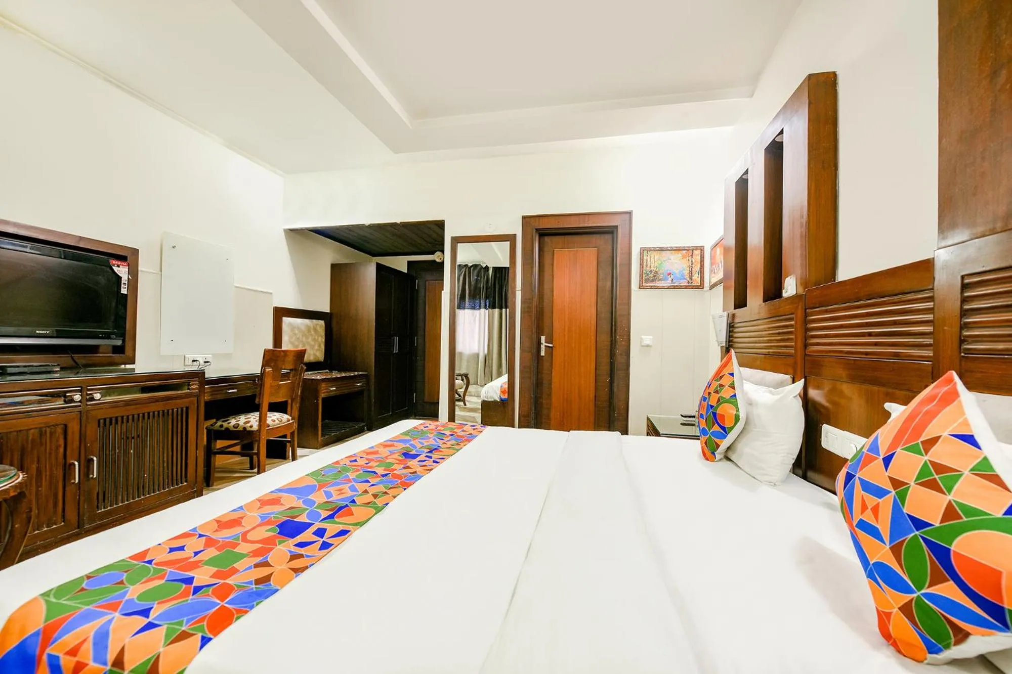 Bed in FabHotel Grand Boutique