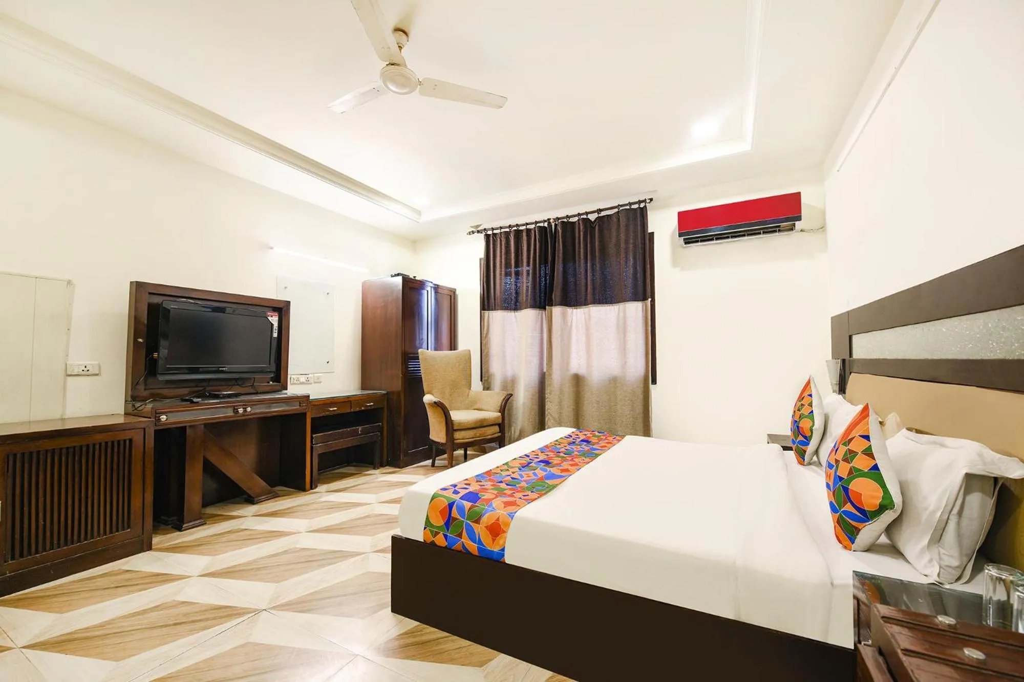 Bed in FabHotel Grand Boutique