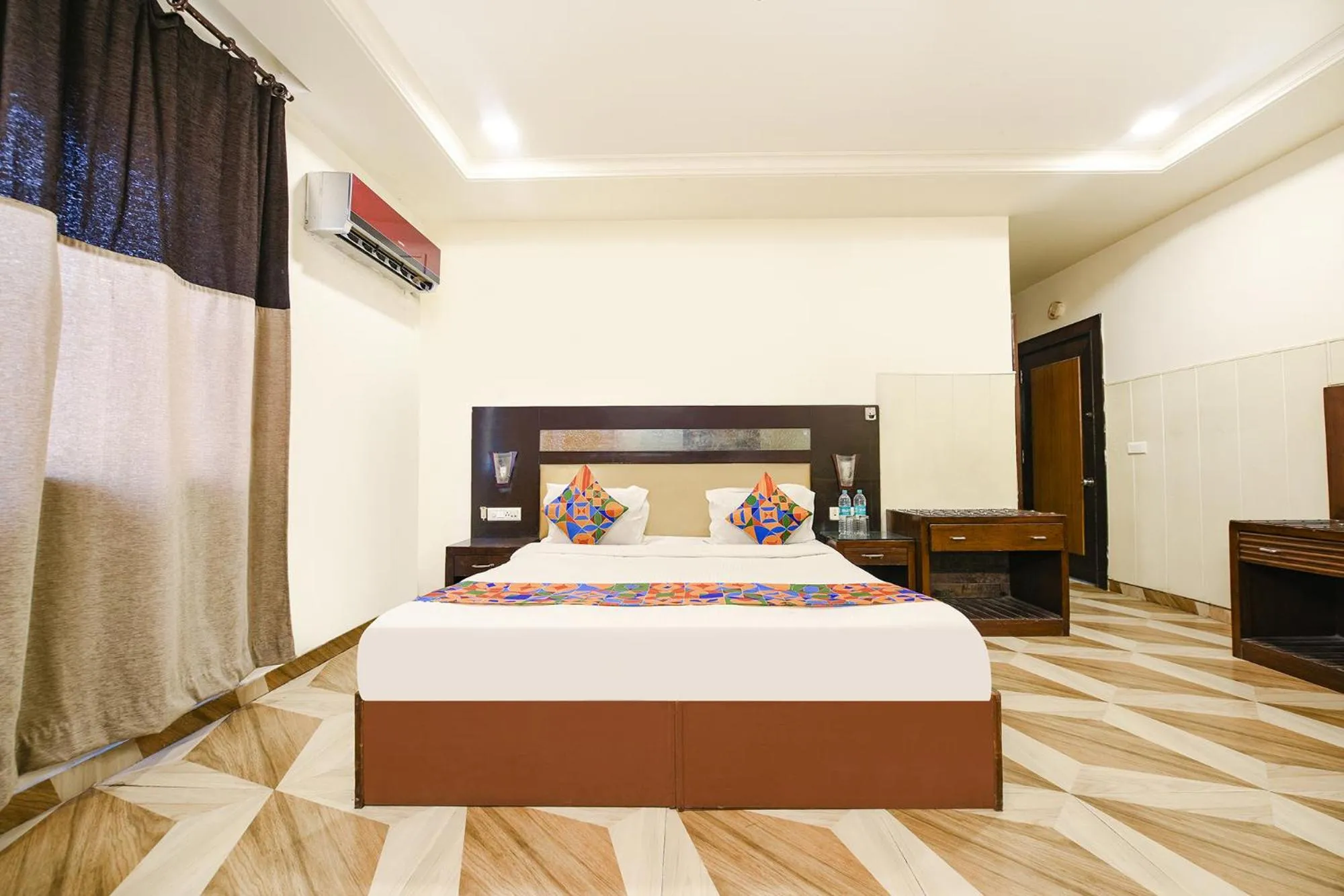 Bed in FabHotel Grand Boutique