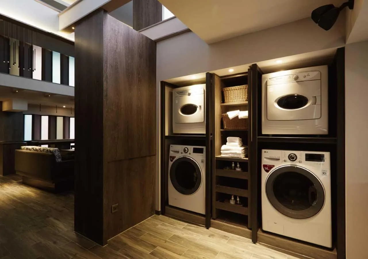 washing machine in At Home Hotel Ximen
