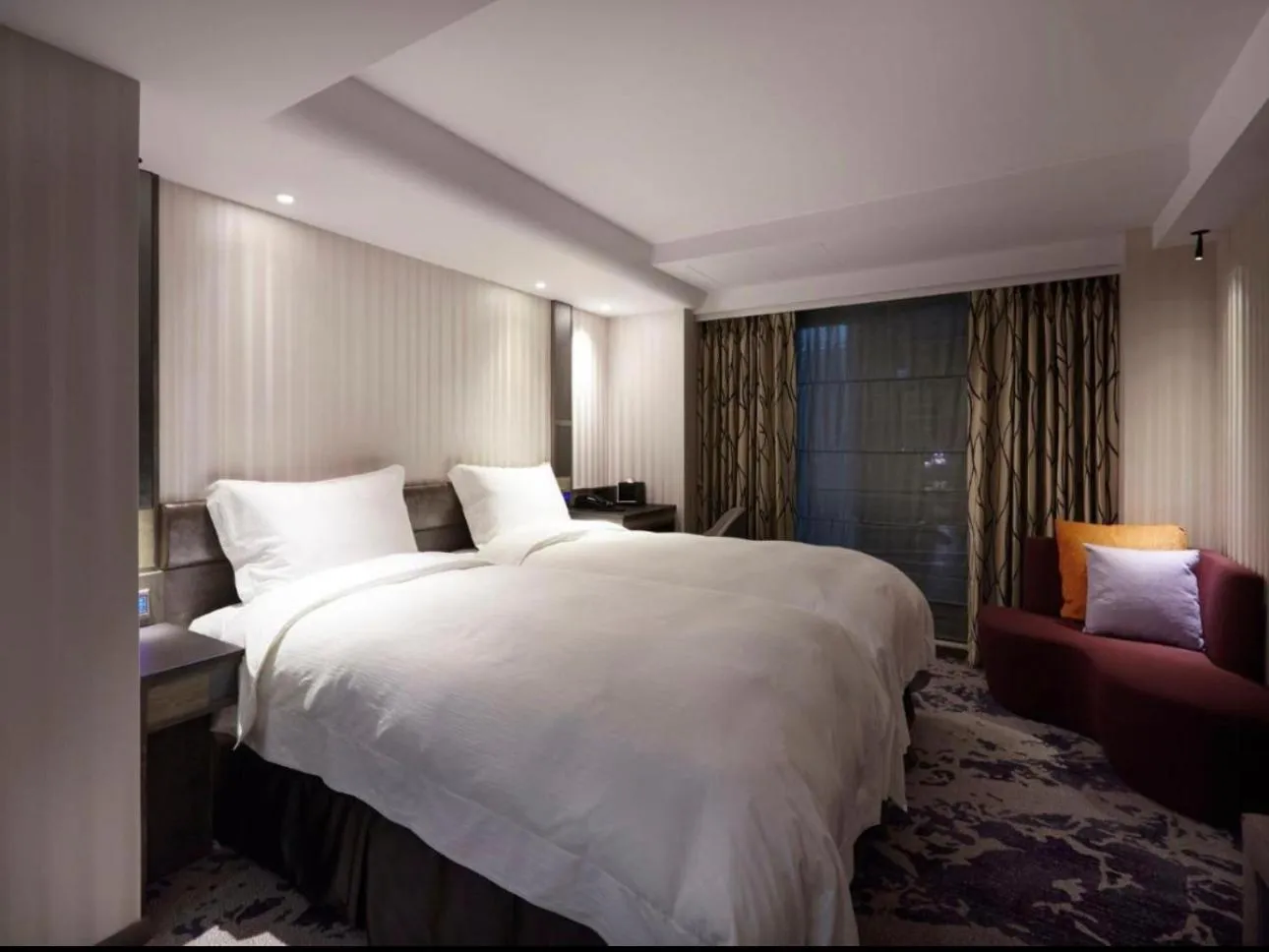 Bed in At Home Hotel Ximen