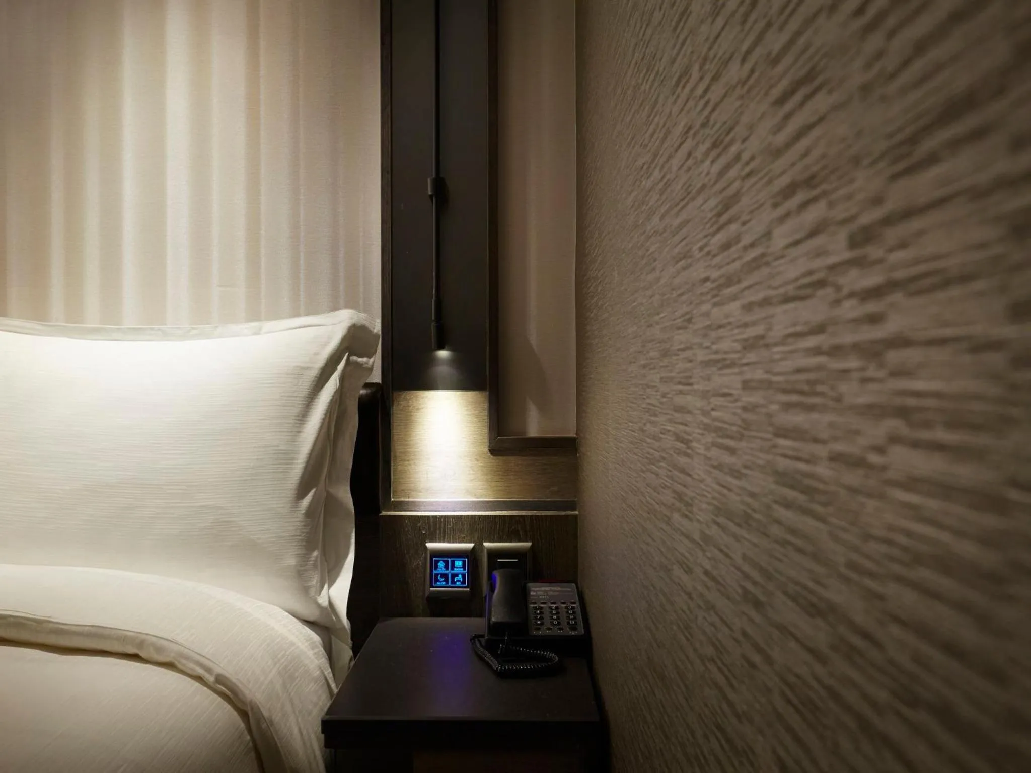 Decorative detail, Bed in At Home Hotel Ximen