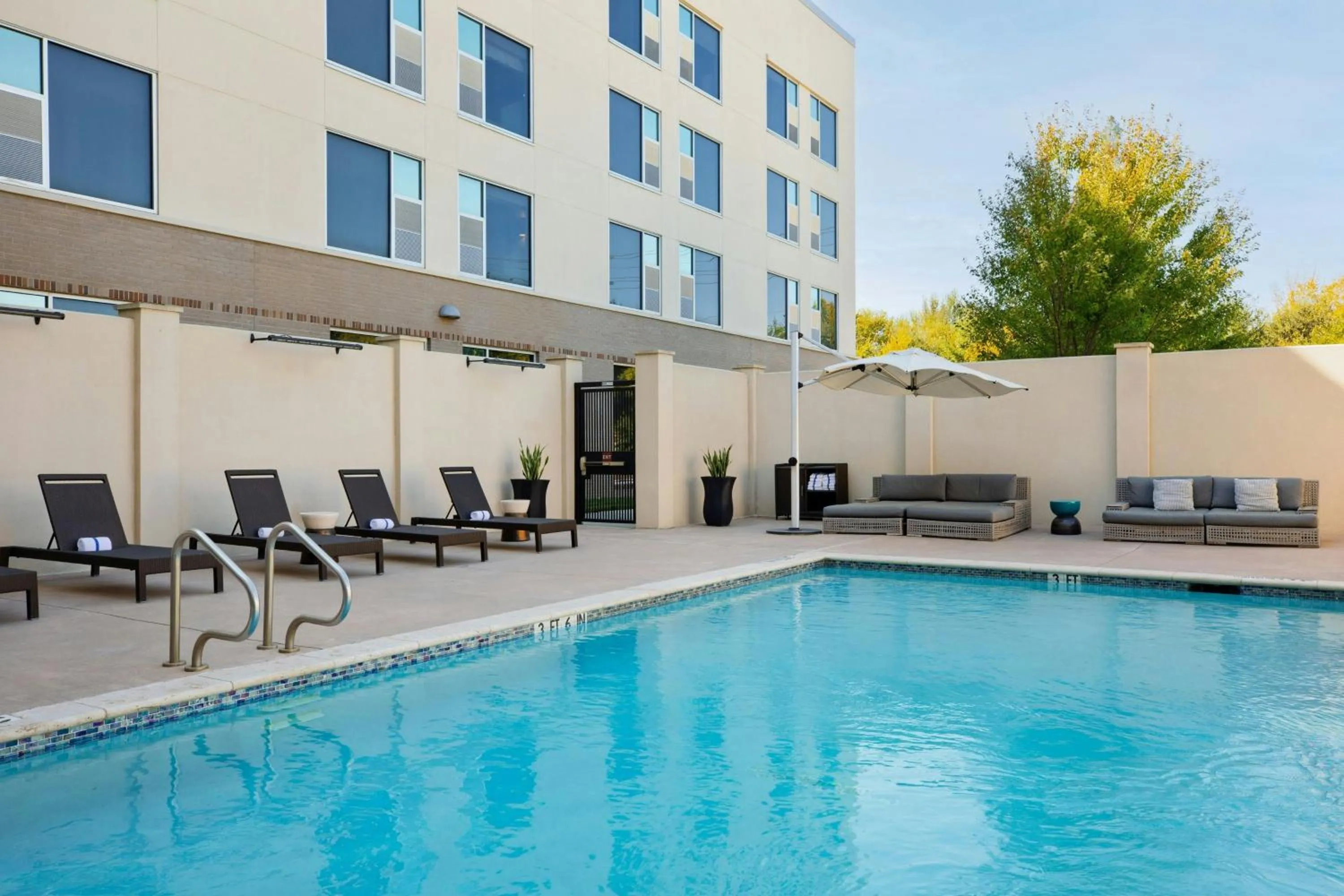 Swimming pool in The Elmore Hotel, DFW Southlake, a Tribute Portfolio Hotel