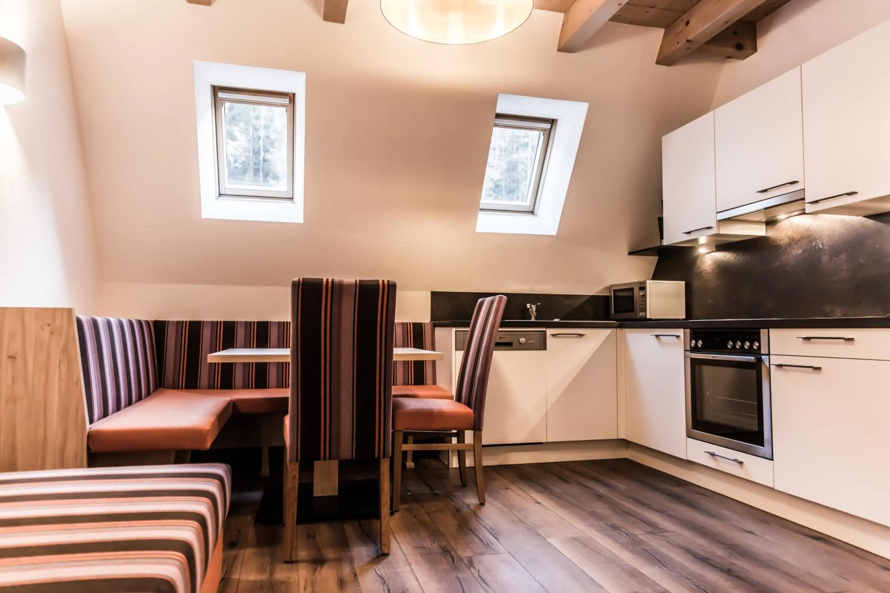 Kitchen or kitchenette in A Casa Smaragd Appartements