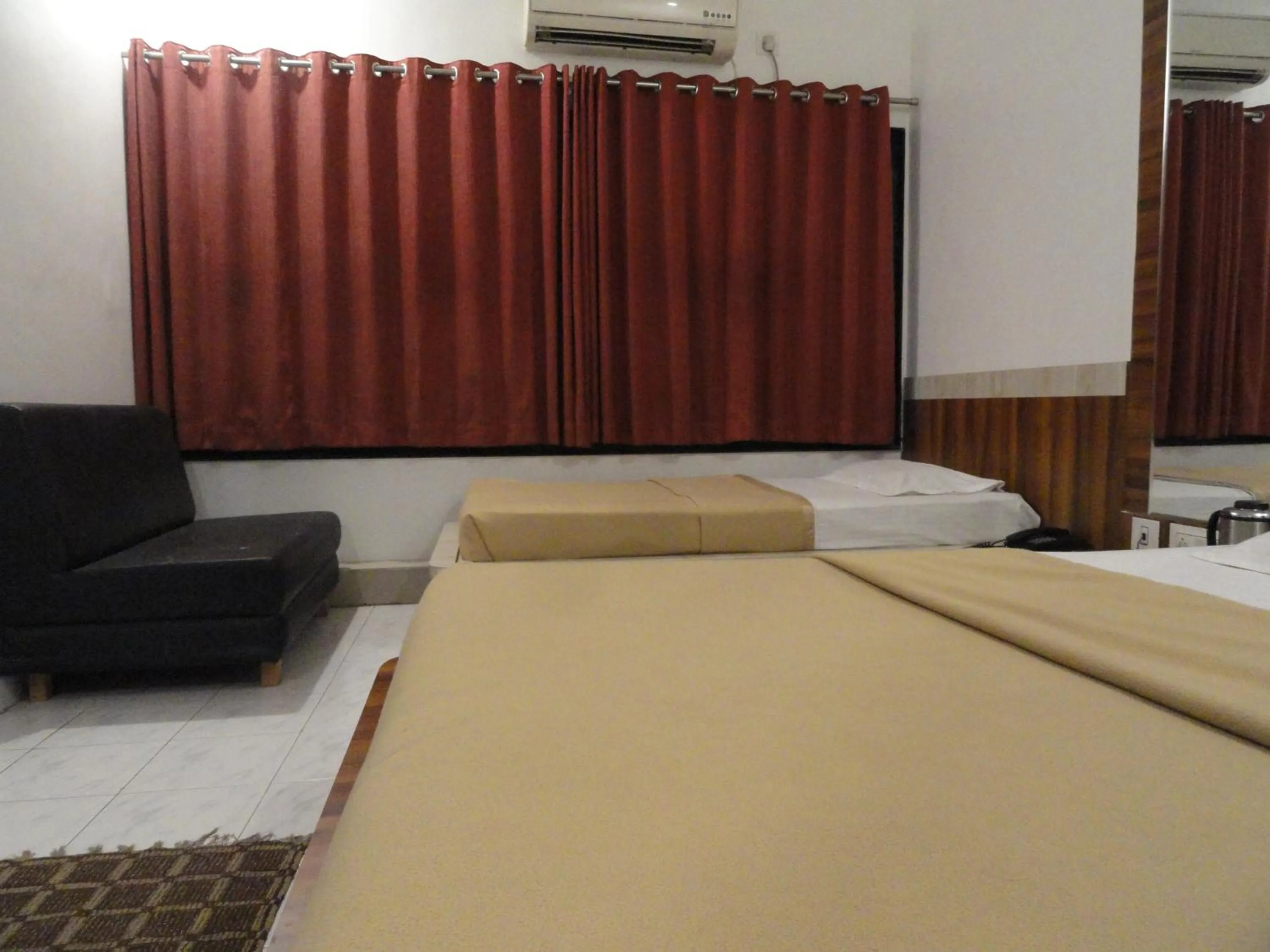 Photo of the whole room, Bed in Hotel Raj