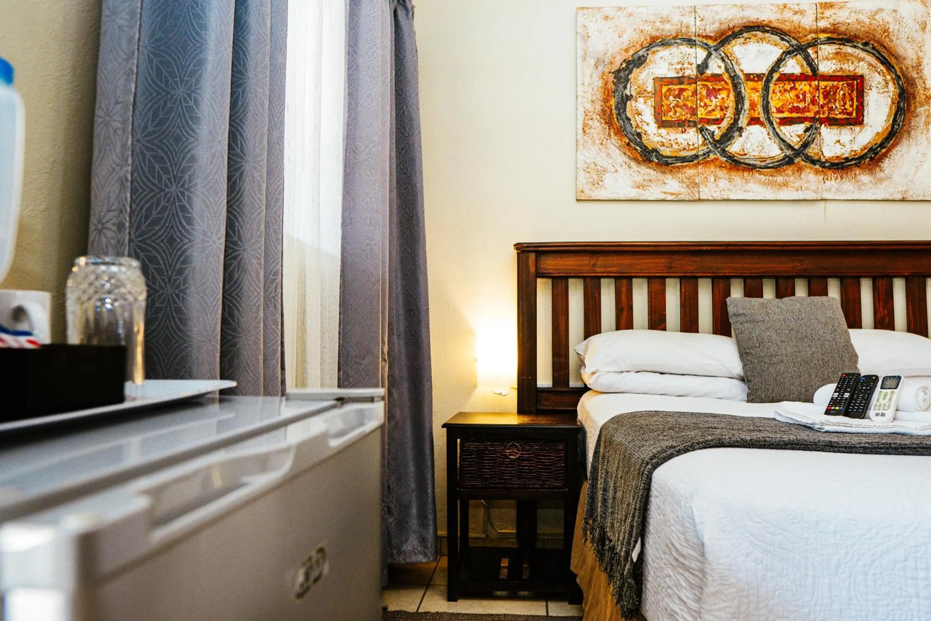 Bedroom in Ehrlichpark Lodge self catering and spa