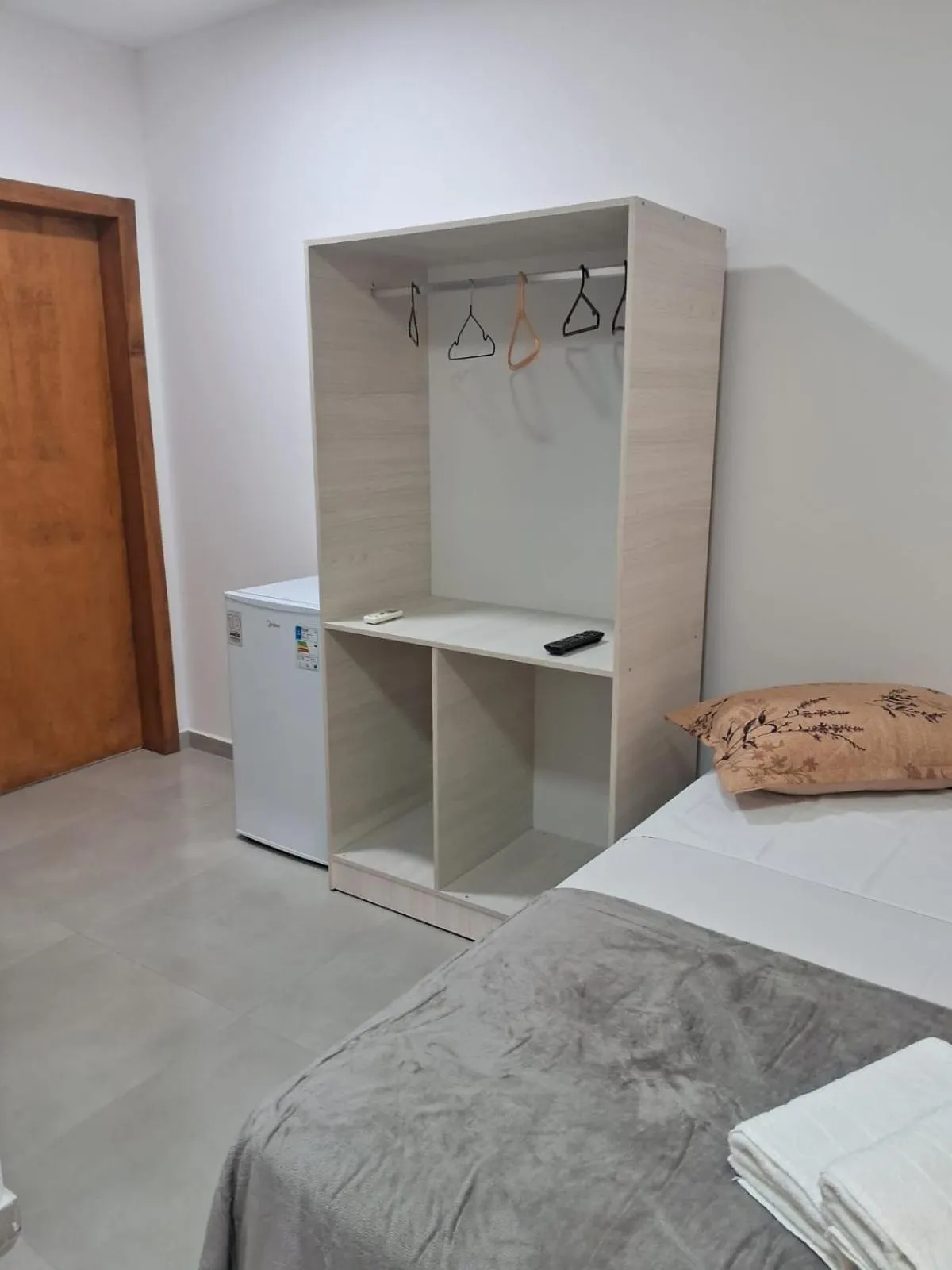 wardrobe, Bed in Pousada casa da amizade