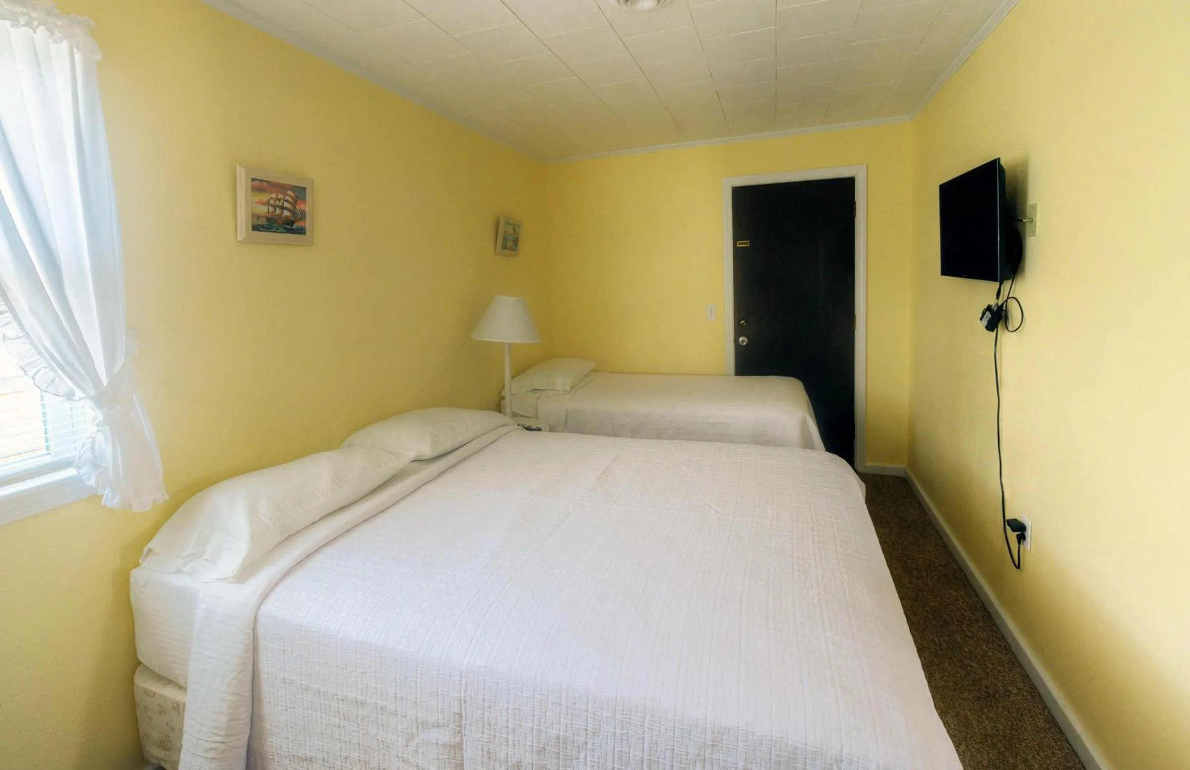 Bed in Outer Banks Motel