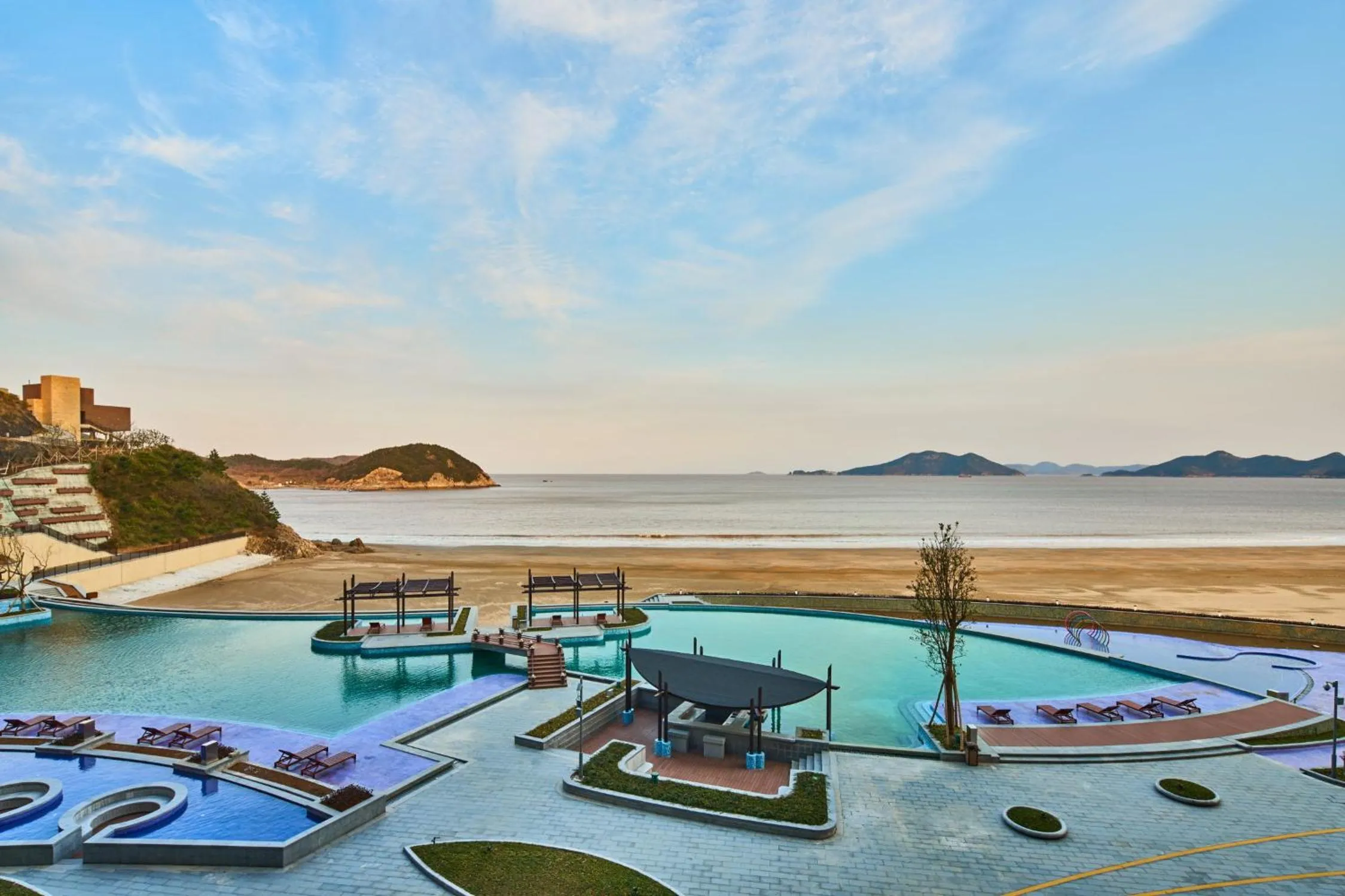 Swimming pool in Crowne Plaza Ningbo Xiangshan Sea View by IHG