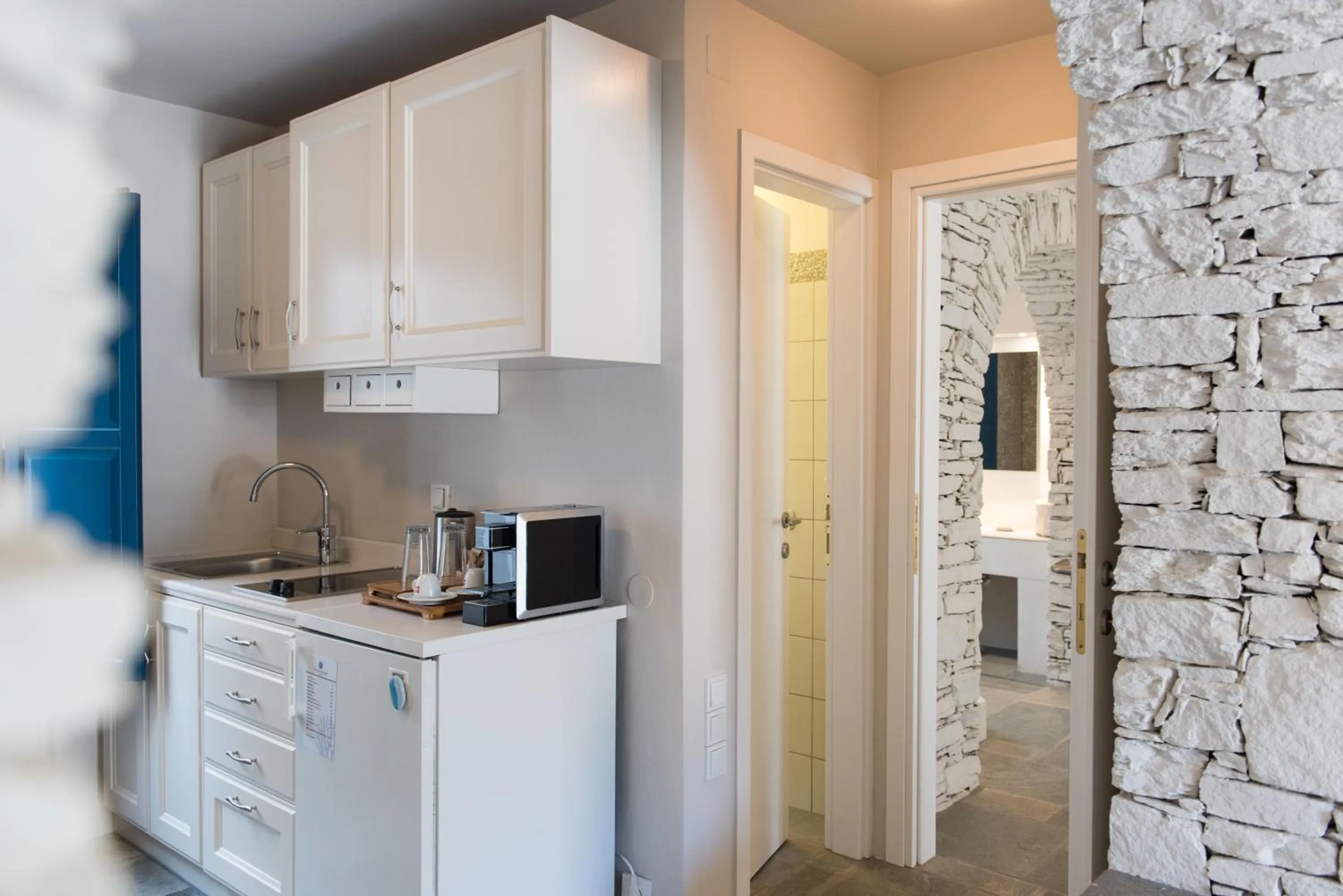 Kitchen or kitchenette in Sifnos House - Rooms and SPA