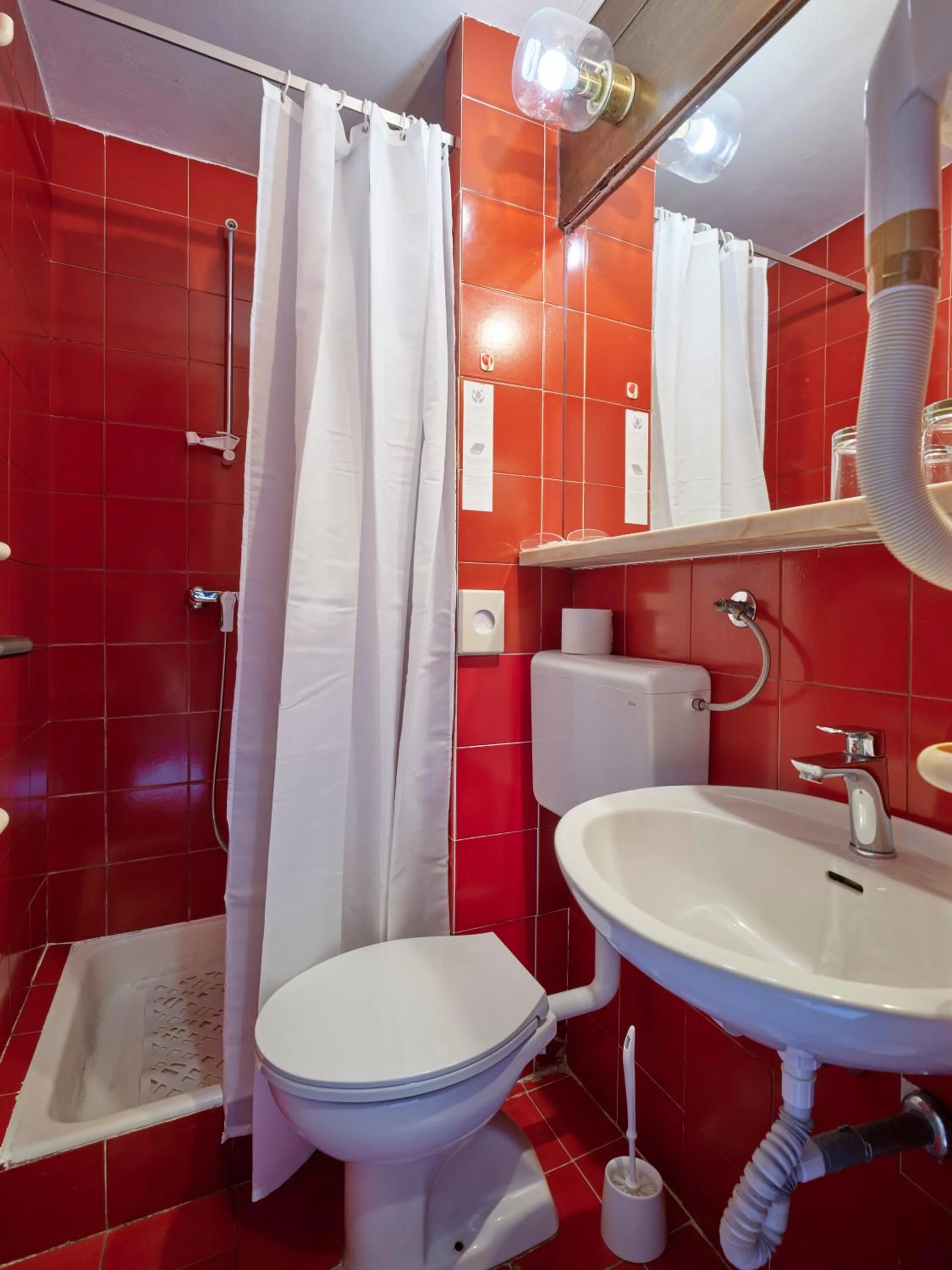 Bathroom in Koversada Rooms