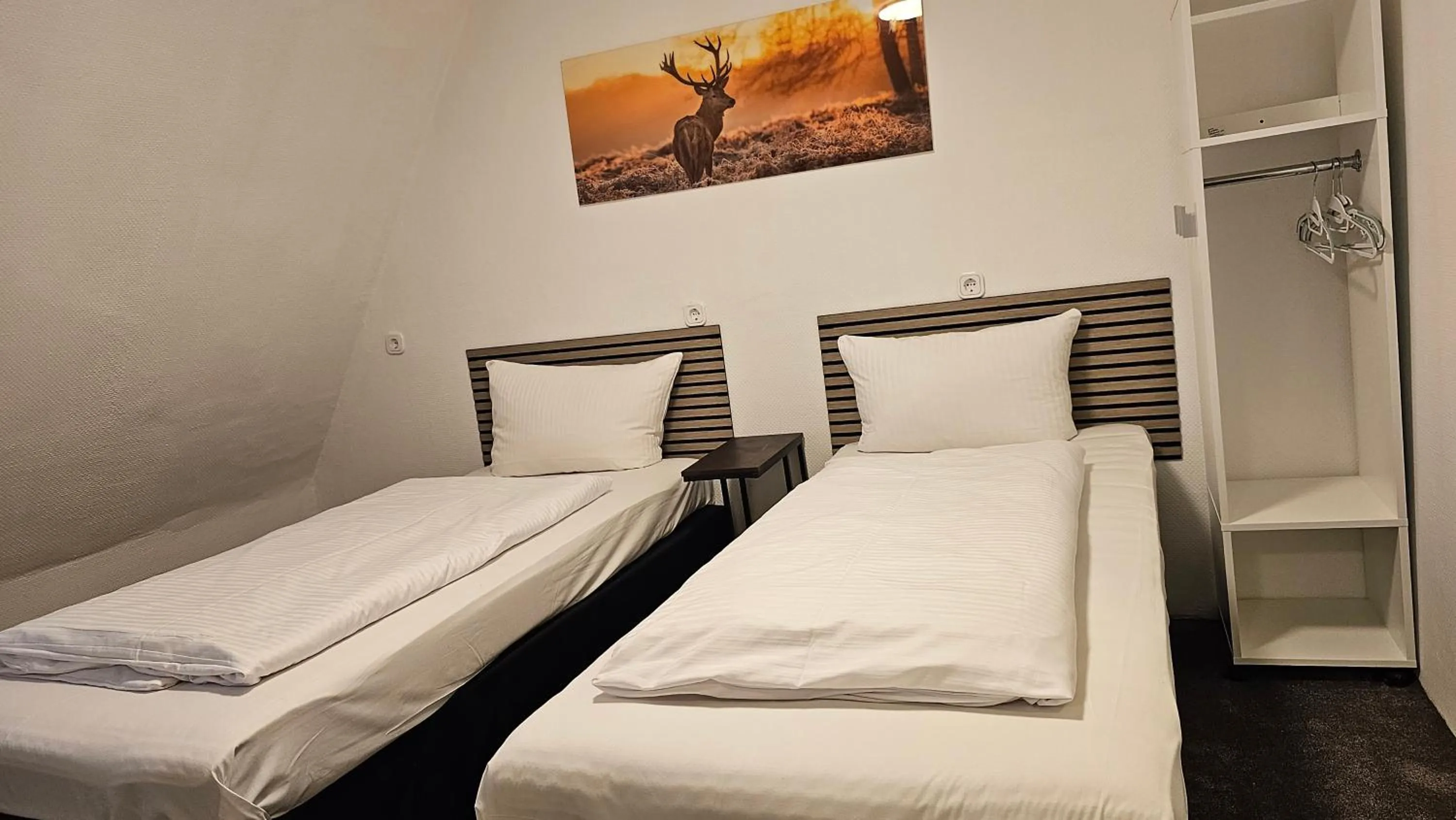 Bed in Hotel Kölner Hof
