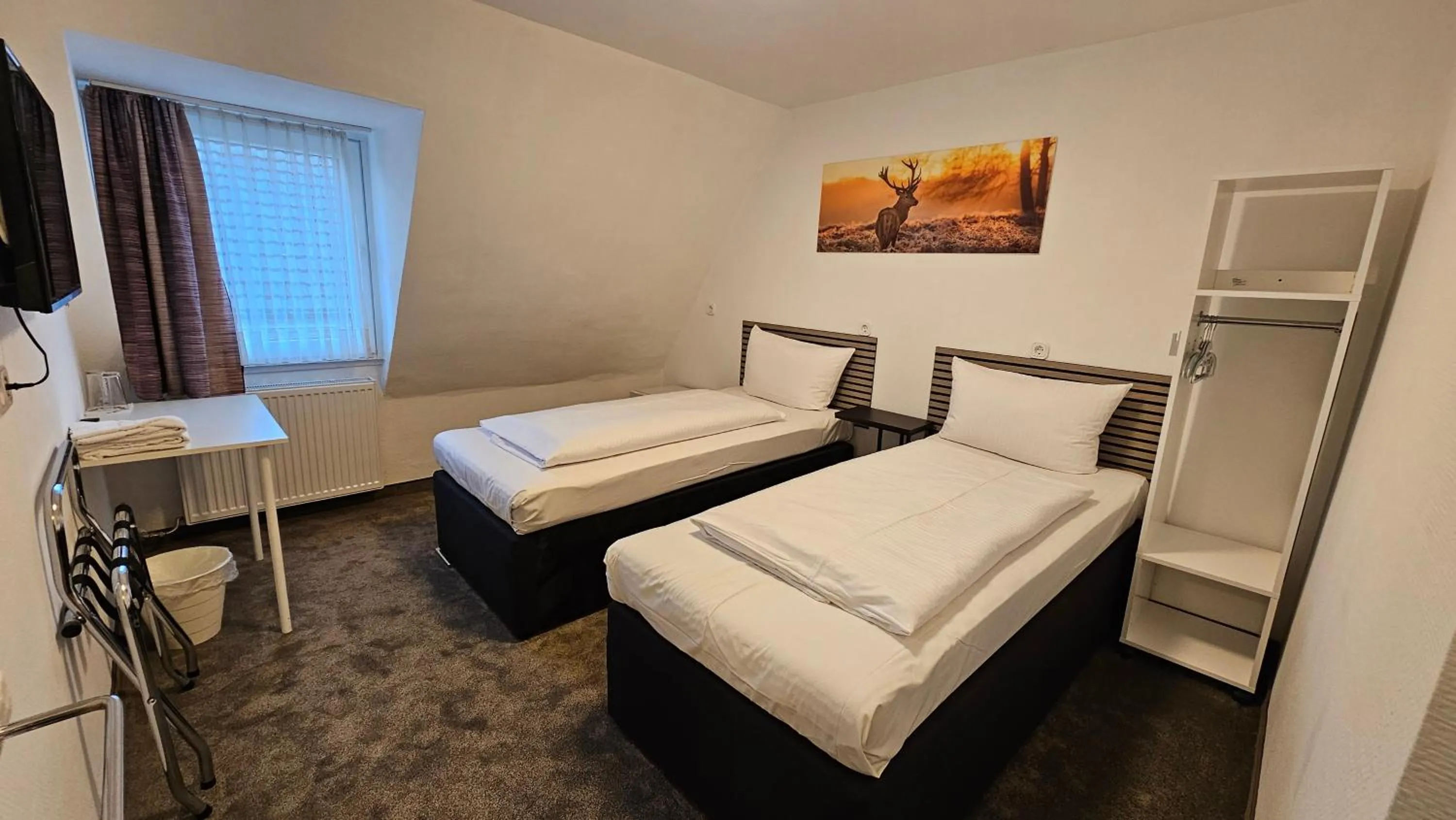 Bed in Hotel Kölner Hof