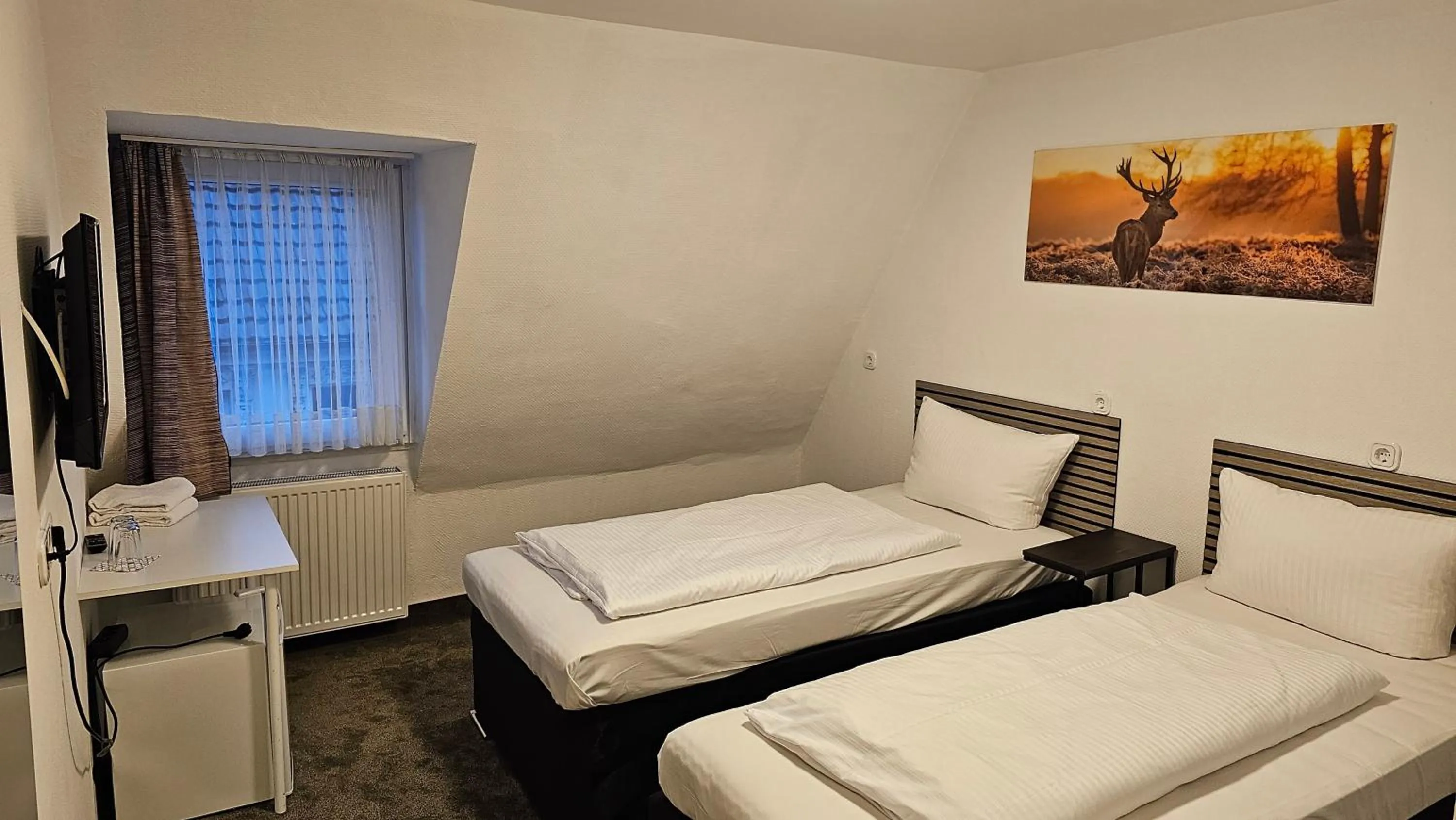 Bed in Hotel Kölner Hof