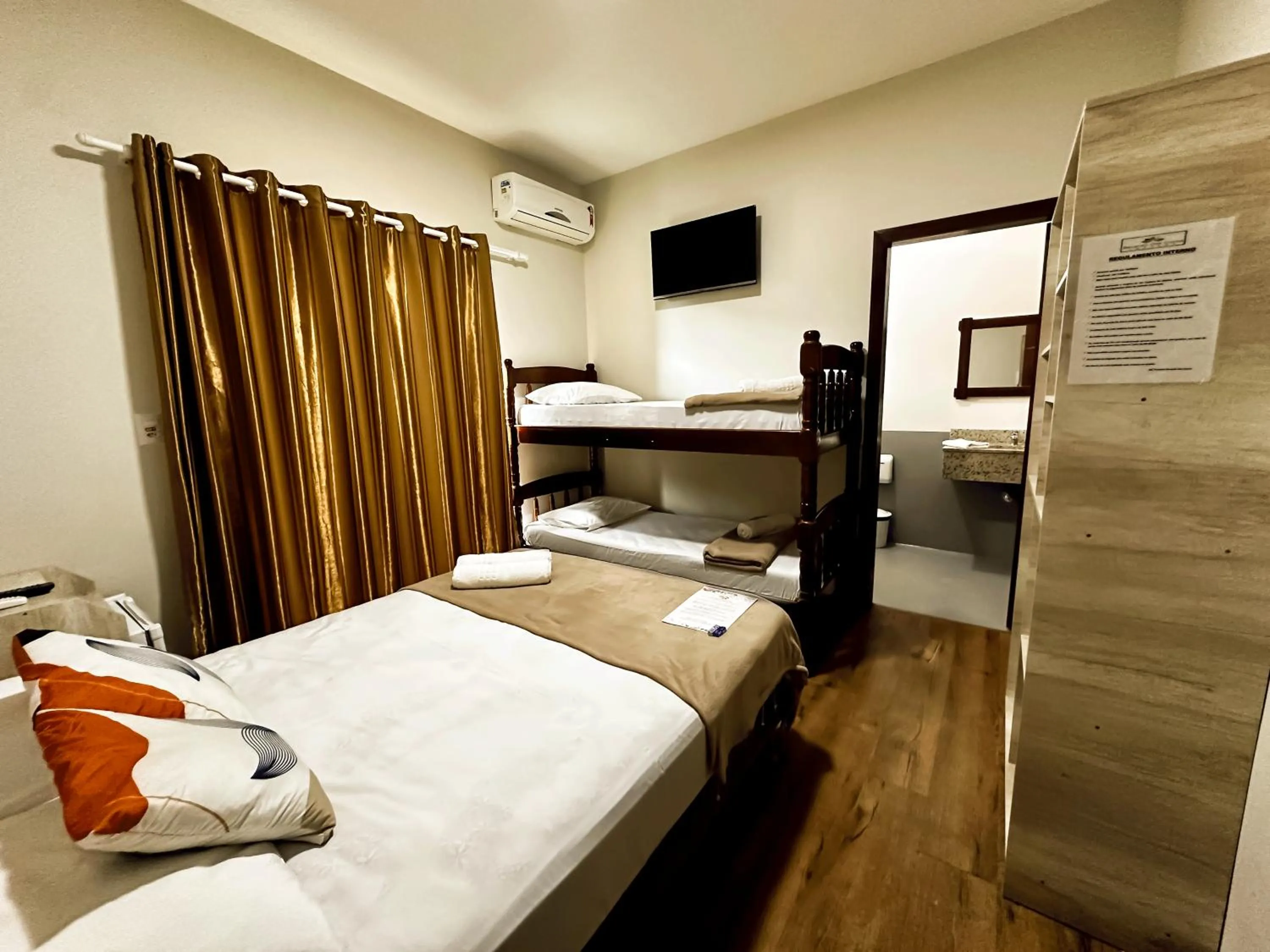 Bed in Pousada Recanto das Cores